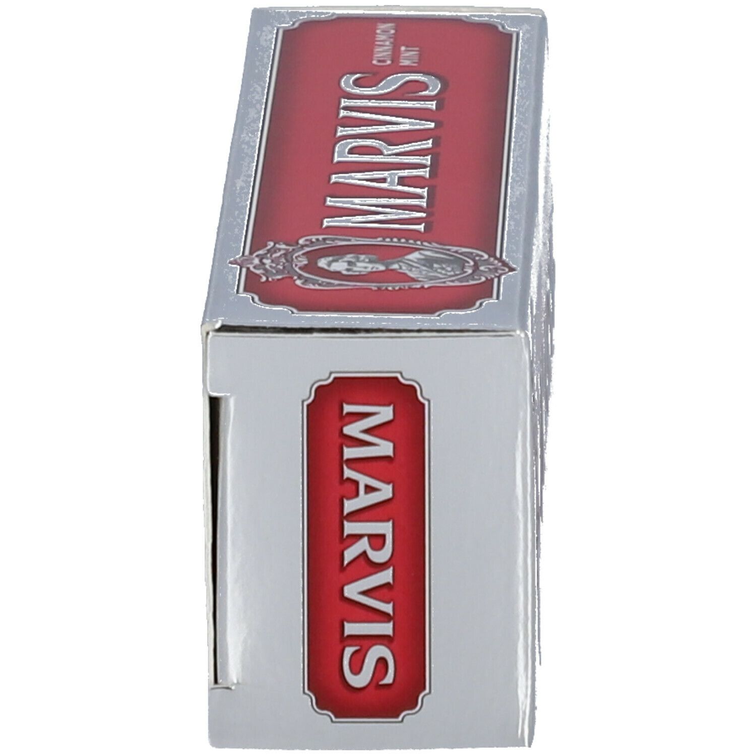 Vue latérale de la boîte de dentifrice MARVIS. Emballage argenté avec logo rouge.