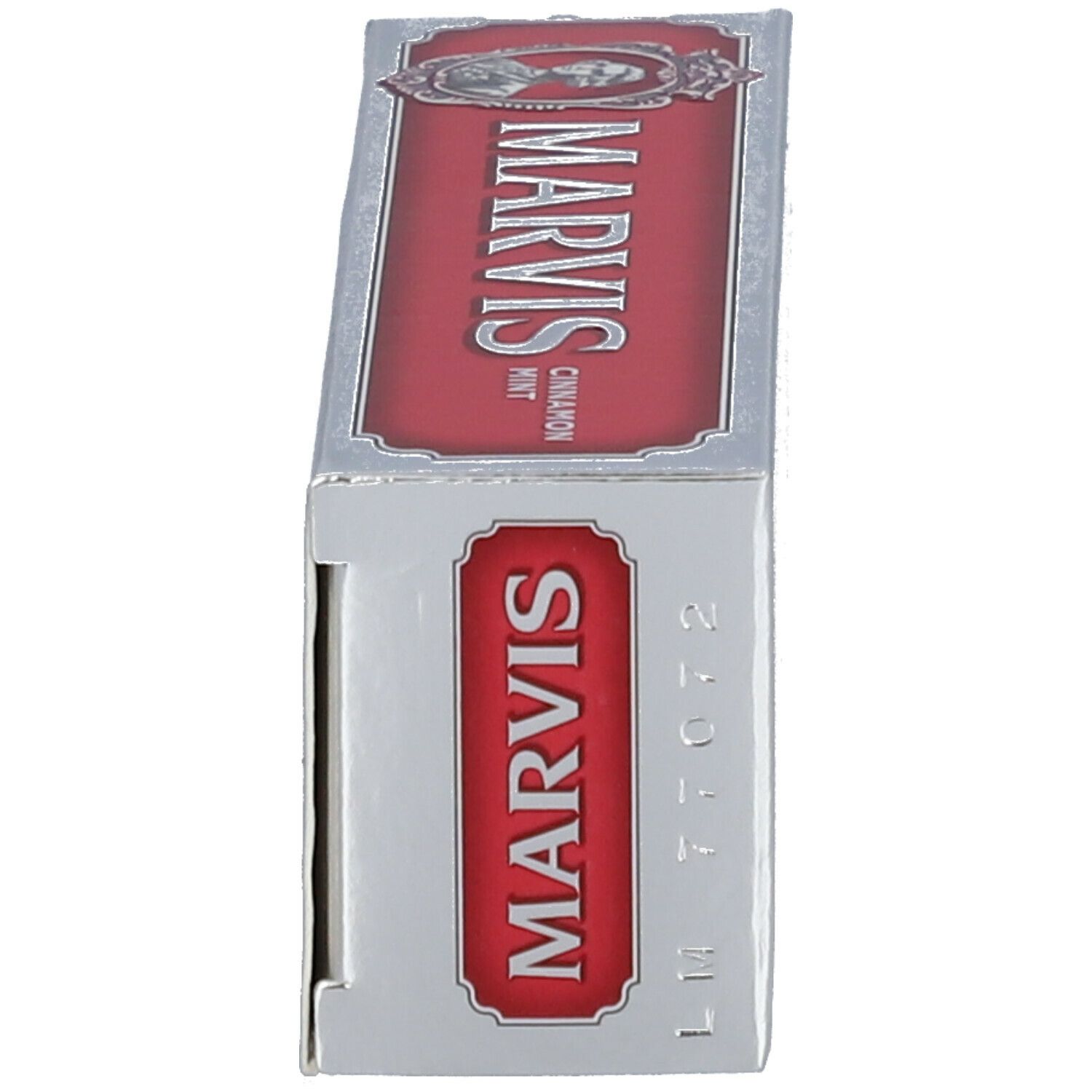 Vue latérale de la boîte de dentifrice MARVIS. Emballage argenté avec logo rouge.