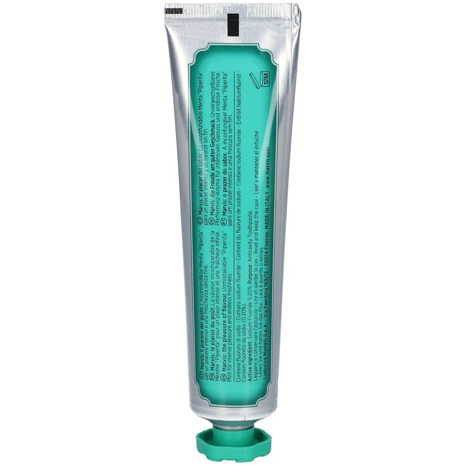 Rückseite einer Zahnpasta-Tube. Silberfarben mit grüner Schrift und Text. Grüner Verschluss.