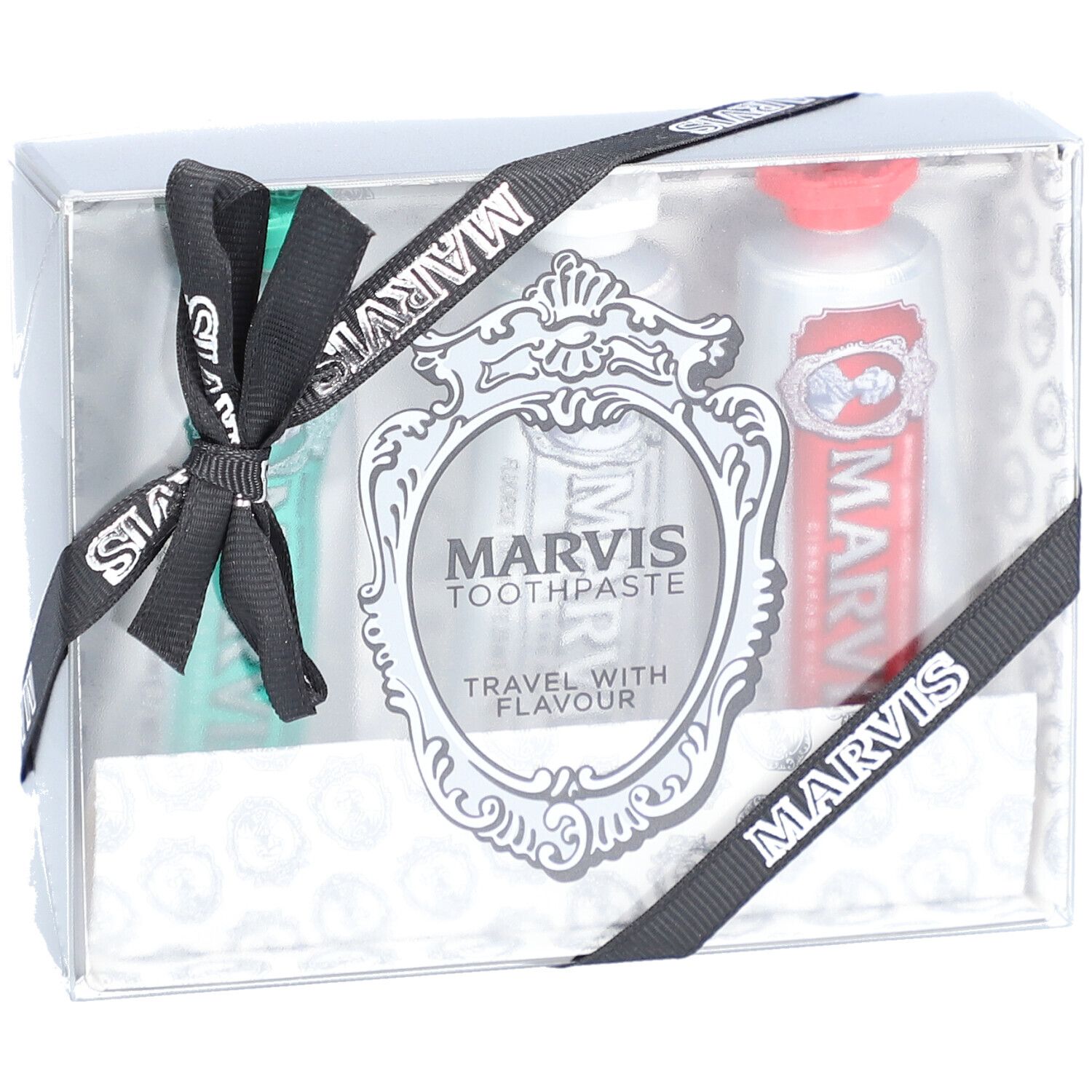 Geschenkdoos met drie tubes tandpasta. Transparante verpakking met zwart lint en logo. MARVIS-logo en tubes zichtbaar.
