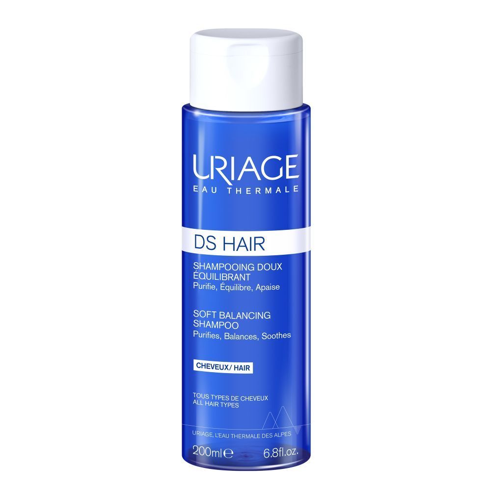 Uriage DS Hair Shampoo, blauwe fles met witte dop. Tekst: DS Hair, Shampooing Doux Équilibrant, Soft Balancing Shampoo.