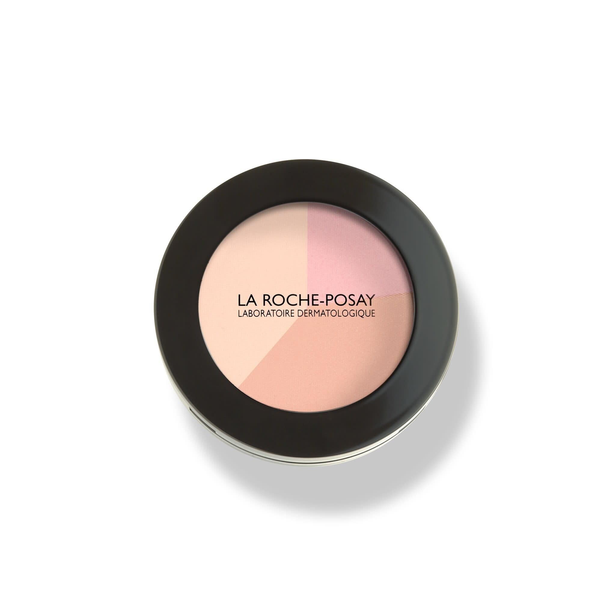 Boîtier rond noir avec trois segments colorés. Inscription : LA ROCHE-POSAY LABORATOIRE DERMATOLOGIQUE.