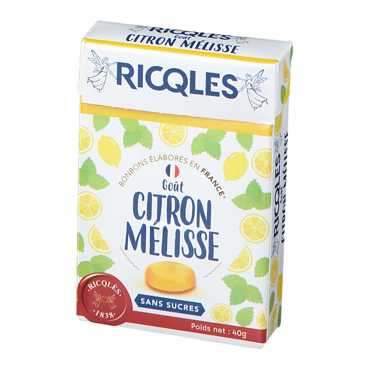 Boîte de bonbons. Inscription: RICQLES, Gout Citron Mélisse, Sans Sucres. Citrons et menthe. Poids net: 40g.