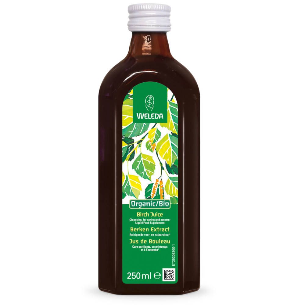 Braune Glasflasche mit weißem Deckel. Grünes Etikett mit Weleda-Logo, Birkenblättern und Text: Birch Juice, Berken Extract, Jus de Bouleau.