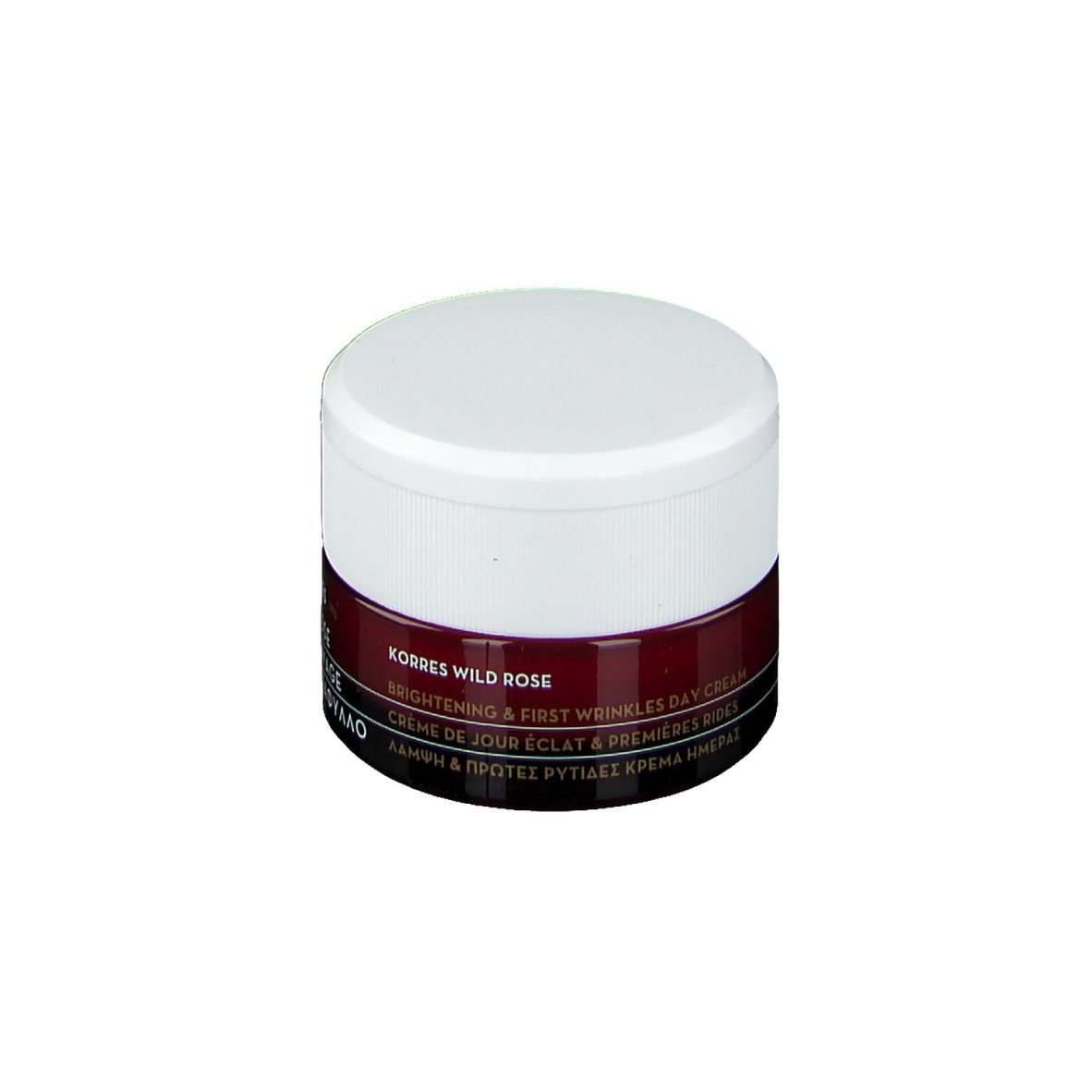 Pot de crème Korres Wild Rose, couvercle blanc, bande rouge foncé. Texte: Brightening & First Wrinkles Day Cream.