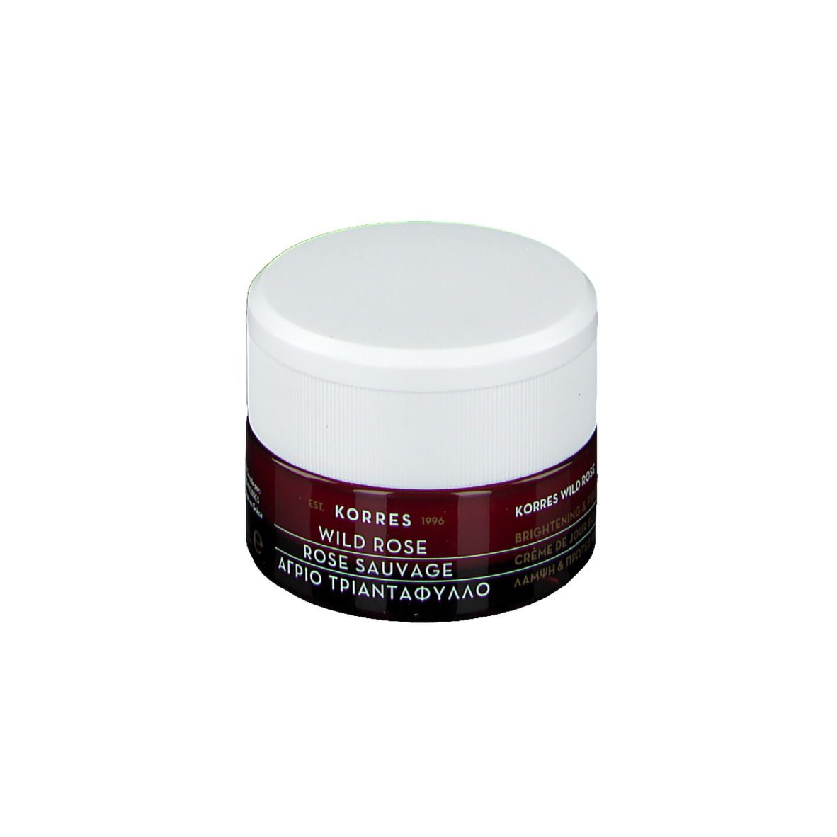 Pot de crème Korres Wild Rose, couvercle blanc, bande rouge foncé. Texte: Wild Rose Rose Sauvage, Brightening & First Wrinkles.