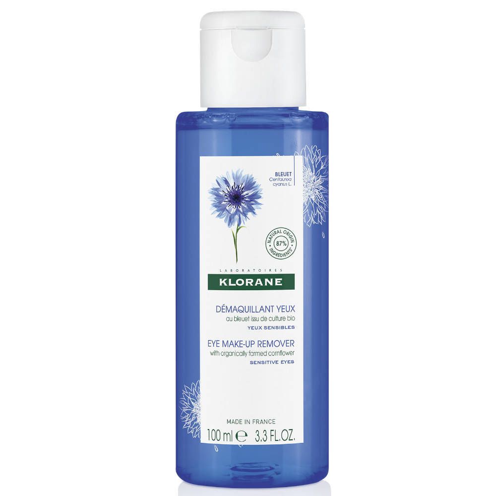 Flacon bleu avec bouchon blanc. Inscription: KLORANE, démaquillant yeux à la bleuet. 100 ml.