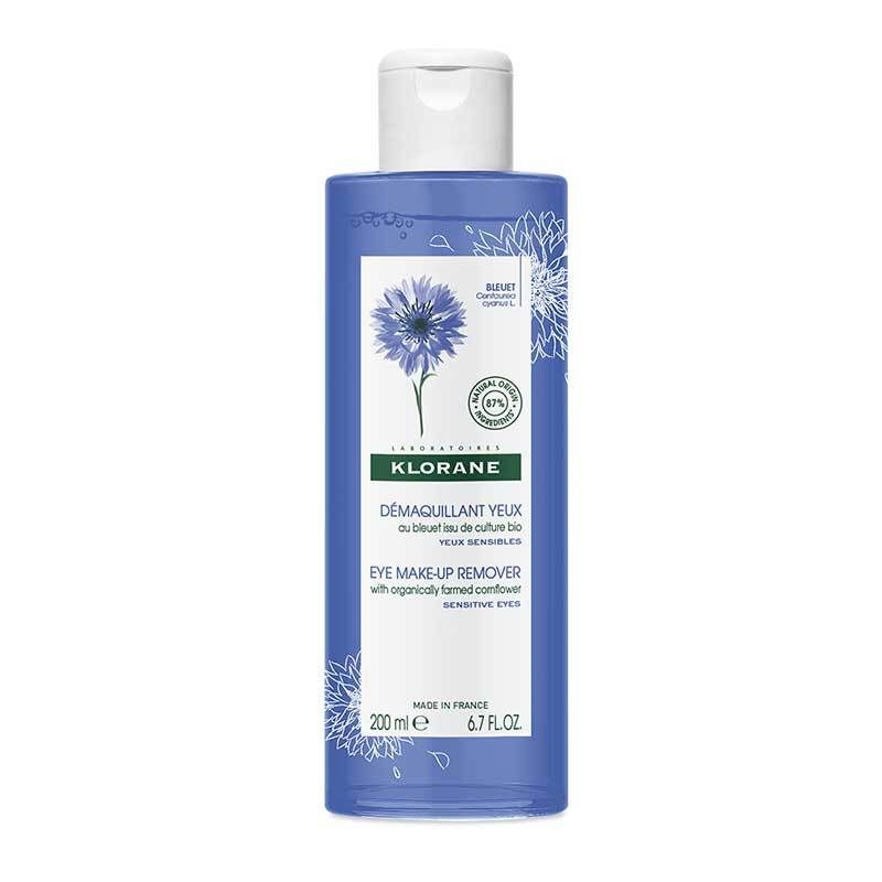 Flacon bleu avec bouchon blanc. Inscription: Klorane, démaquillant yeux à la bleuet. 200 ml.