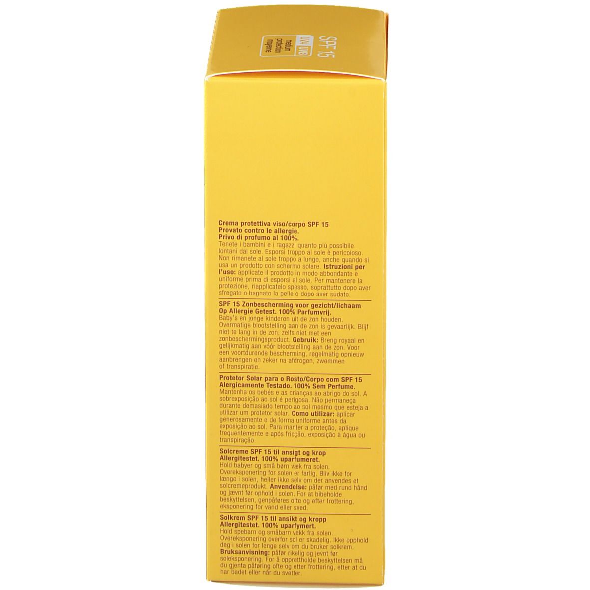 Boîte jaune avec texte. Dos avec informations multilingues. Inscription : SPF 15.