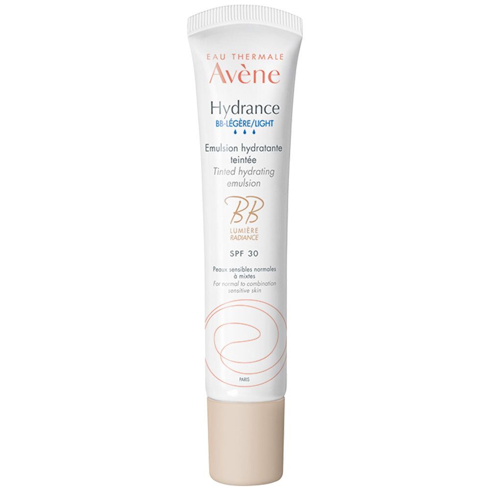 Tube de crème avec nom du produit et SPF 30. Tube blanc avec bouchon beige clair. Texte en allemand et français.
