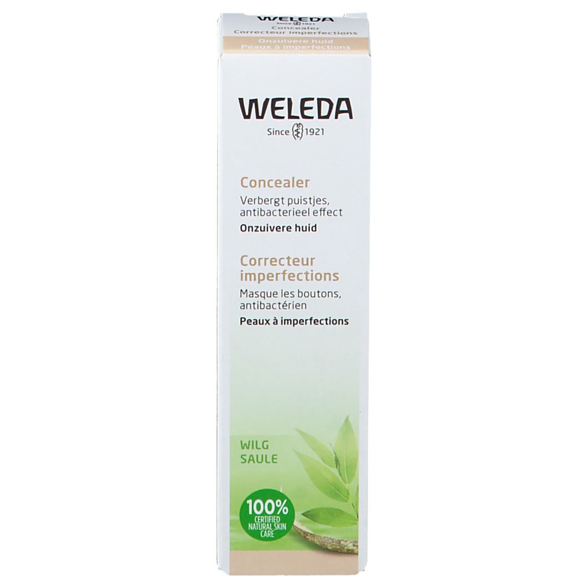 Schachtel. Aufschrift: WELEDA, Concealer, Corretteur imperfections. Grün-weiß. Zertifizierung: 100% Natural Skin Care.