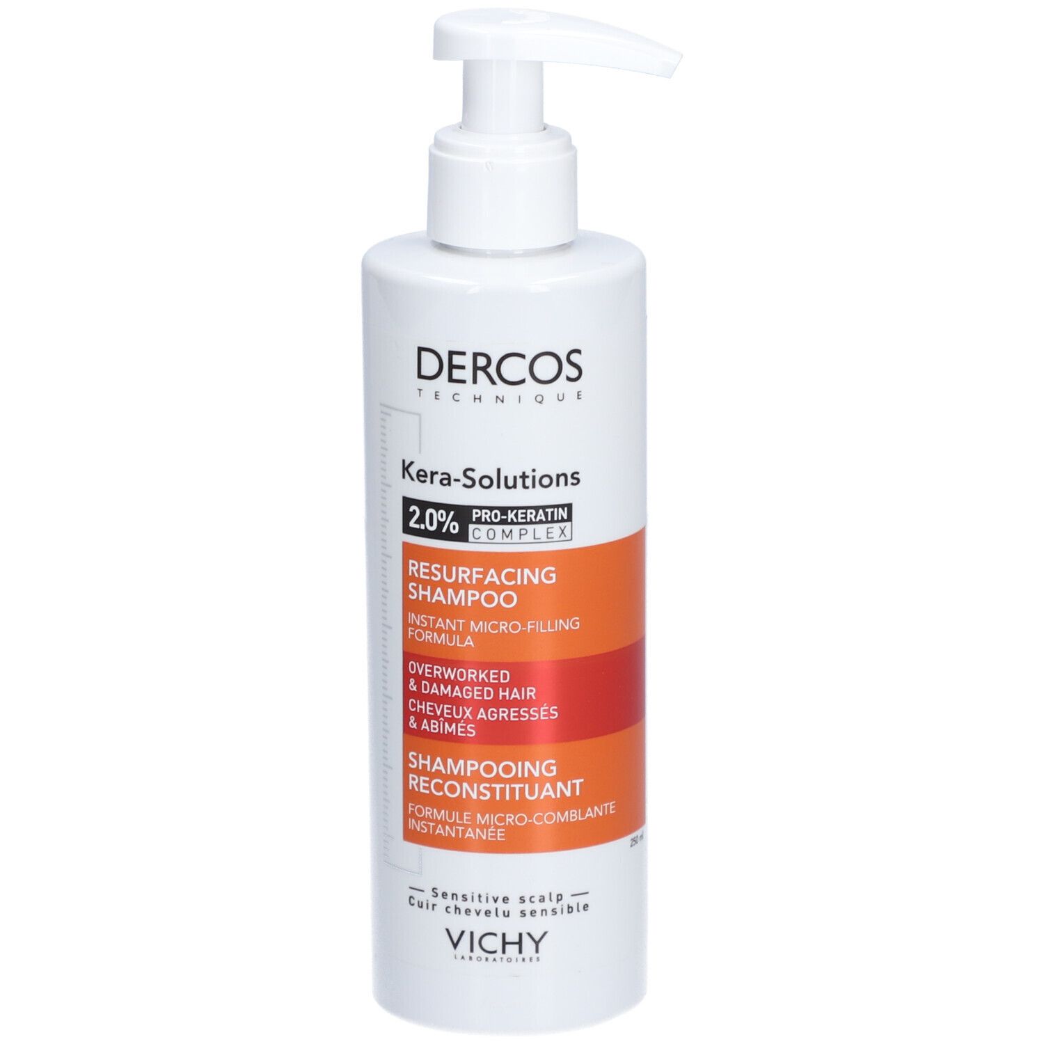 Witte shampoo fles met pomp. Opschrift: Dercos Kera-Solutions, Shampoo. Voor beschadigd haar.