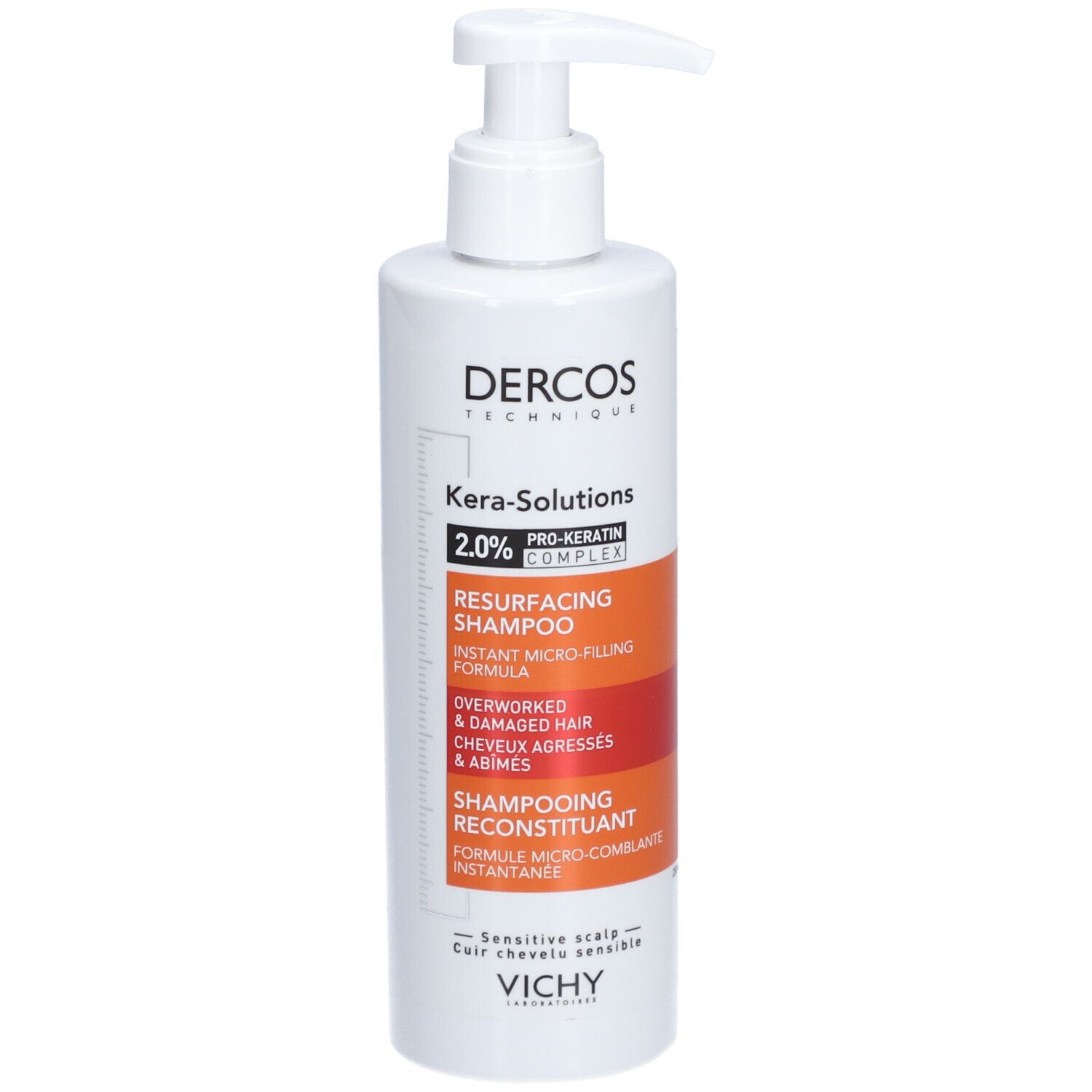 Witte shampoo fles met pomp. Opschrift: Dercos Kera-Solutions, Shampoo. Voor beschadigd haar.