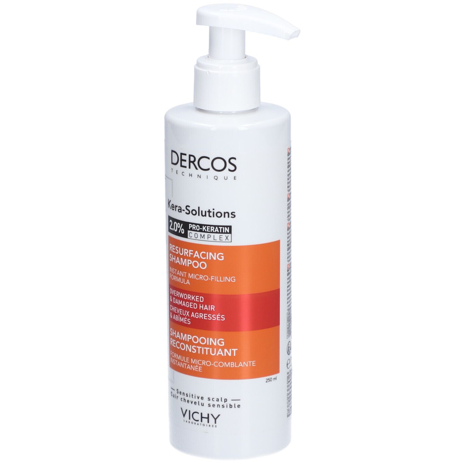 Witte shampoo fles met pomp. Opschrift: Dercos Kera-Solutions, Shampoo. Voor beschadigd haar.