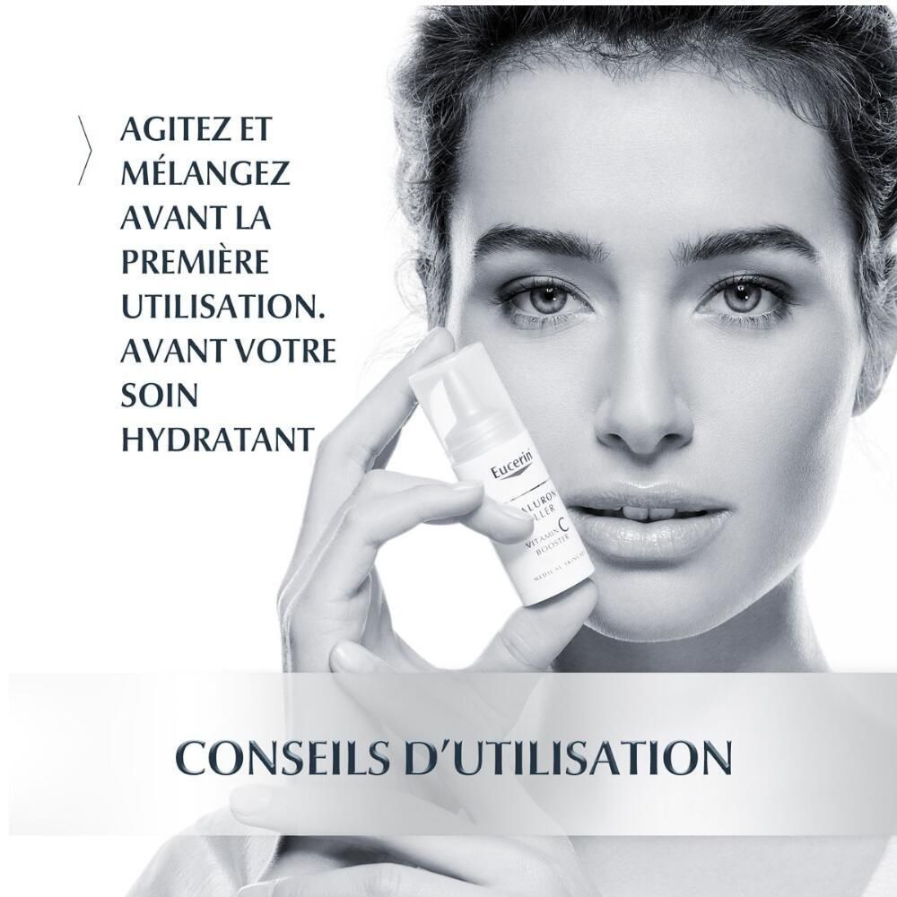 Femme tenant un petit flacon Eucerin Hyaluron-Filler Vitamin C Booster. Texte : Conseils d'utilisation, mélanger avant la première utilisation.