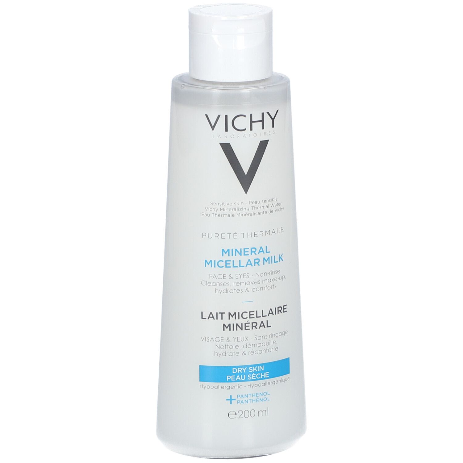 Flacon blanc avec étiquette bleu et blanc. Logo Vichy et nom du produit: Lait Micellaire Minéral. Pour peaux sensibles.