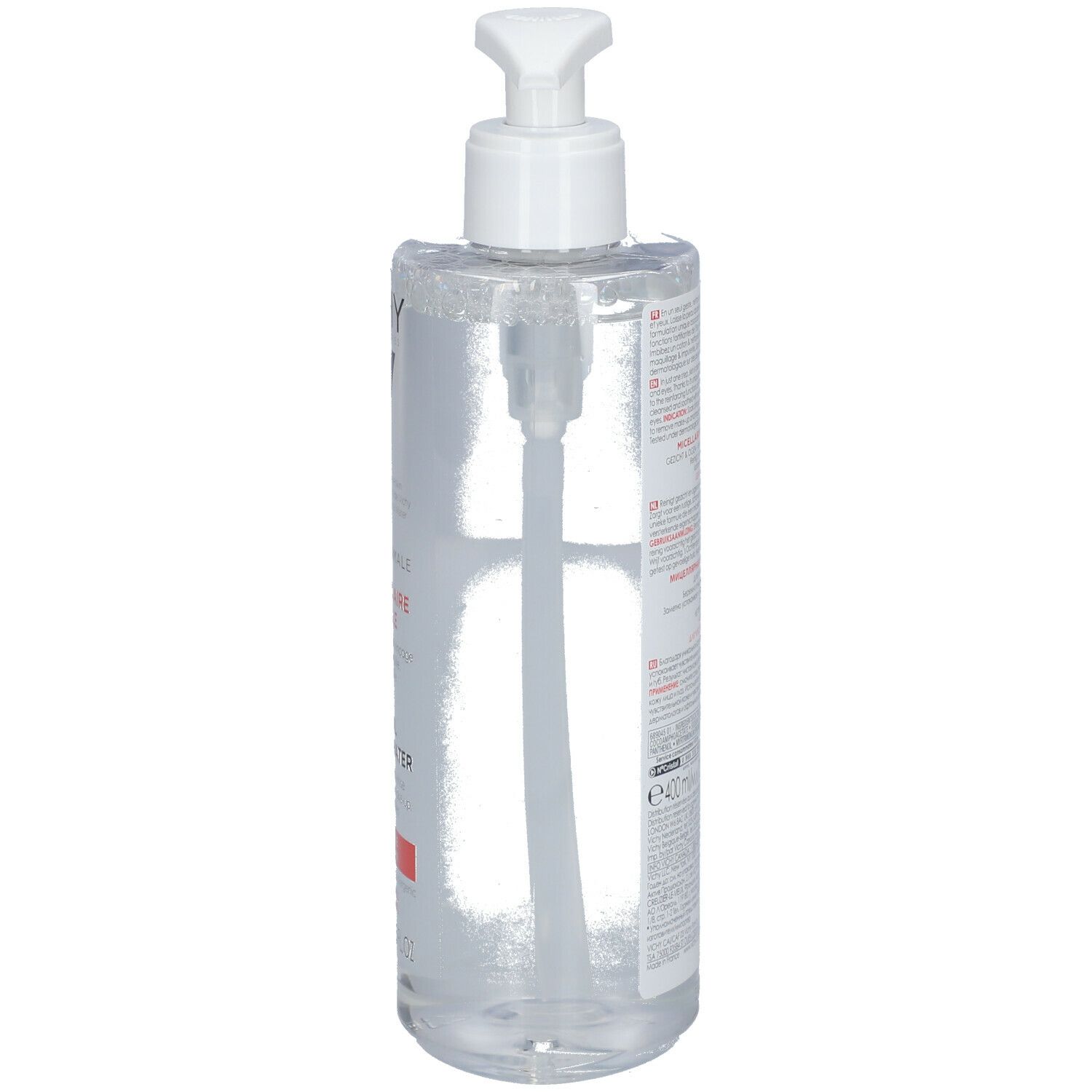 Transparente Flasche mit weißem Pumpkopf. Produkt ist sichtbar. Etikett mit Produktinformationen.