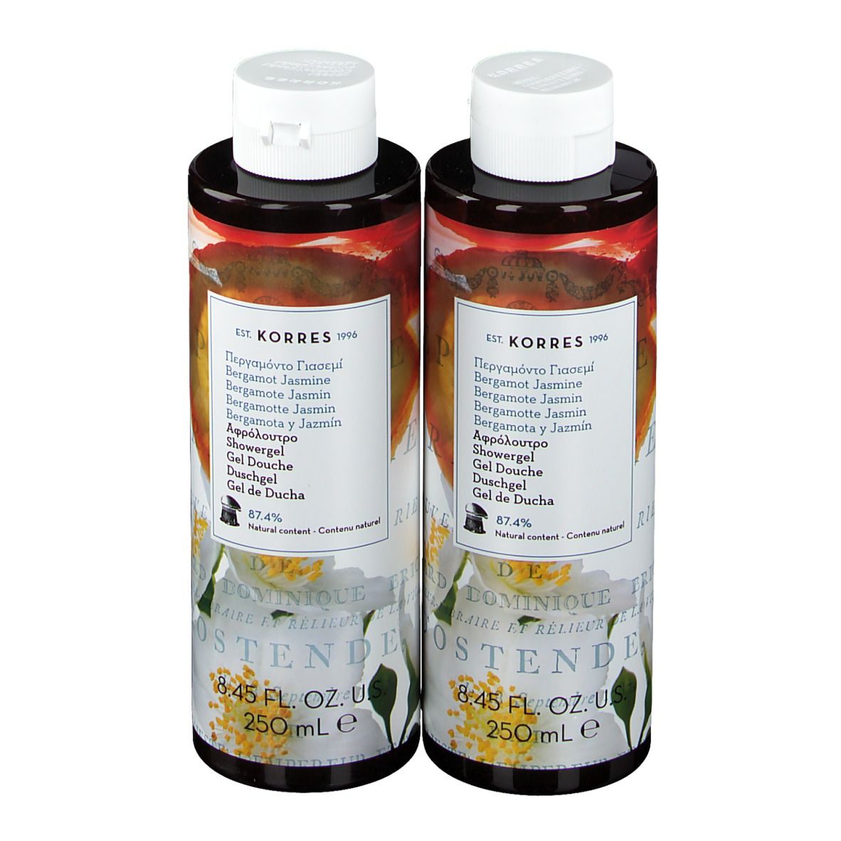 Zwei Flaschen Duschgel mit weißem Deckel. Etikett mit Produktnamen und floralem Design. 8.45 FL. OZ. US.