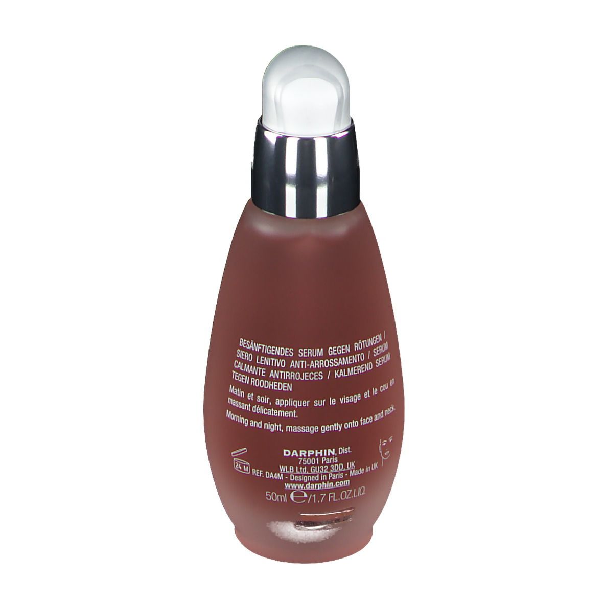 Flacon de sérum rouge avec pompe argentée. Inscription au dos. Texte multilingue.