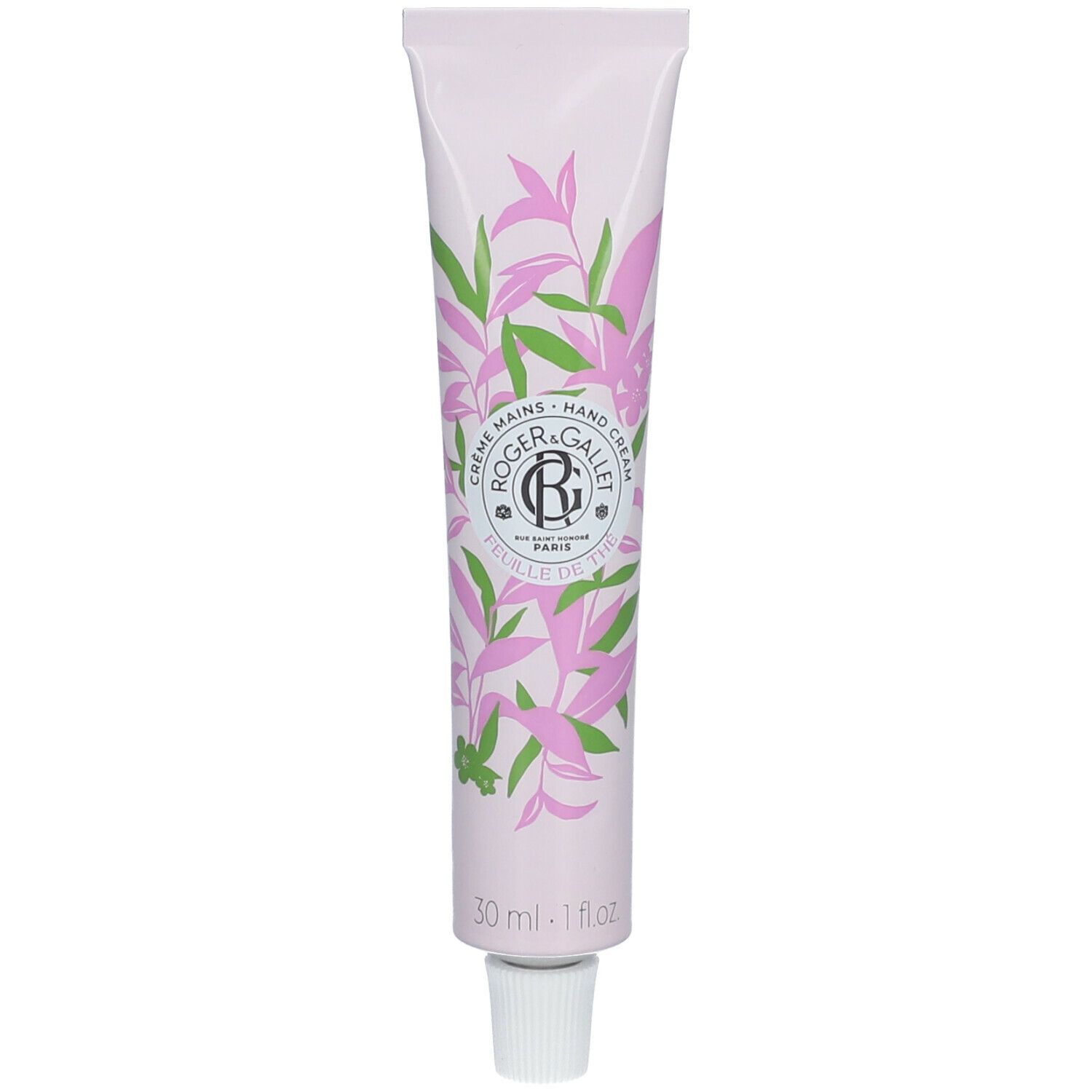 Rosa Tube mit grünen und rosa Pflanzenmotiven. Schriftzug: Roger & Gallet, Crème Mains, FEUILLE DE THÉ. Weiße Verschlusskappe.