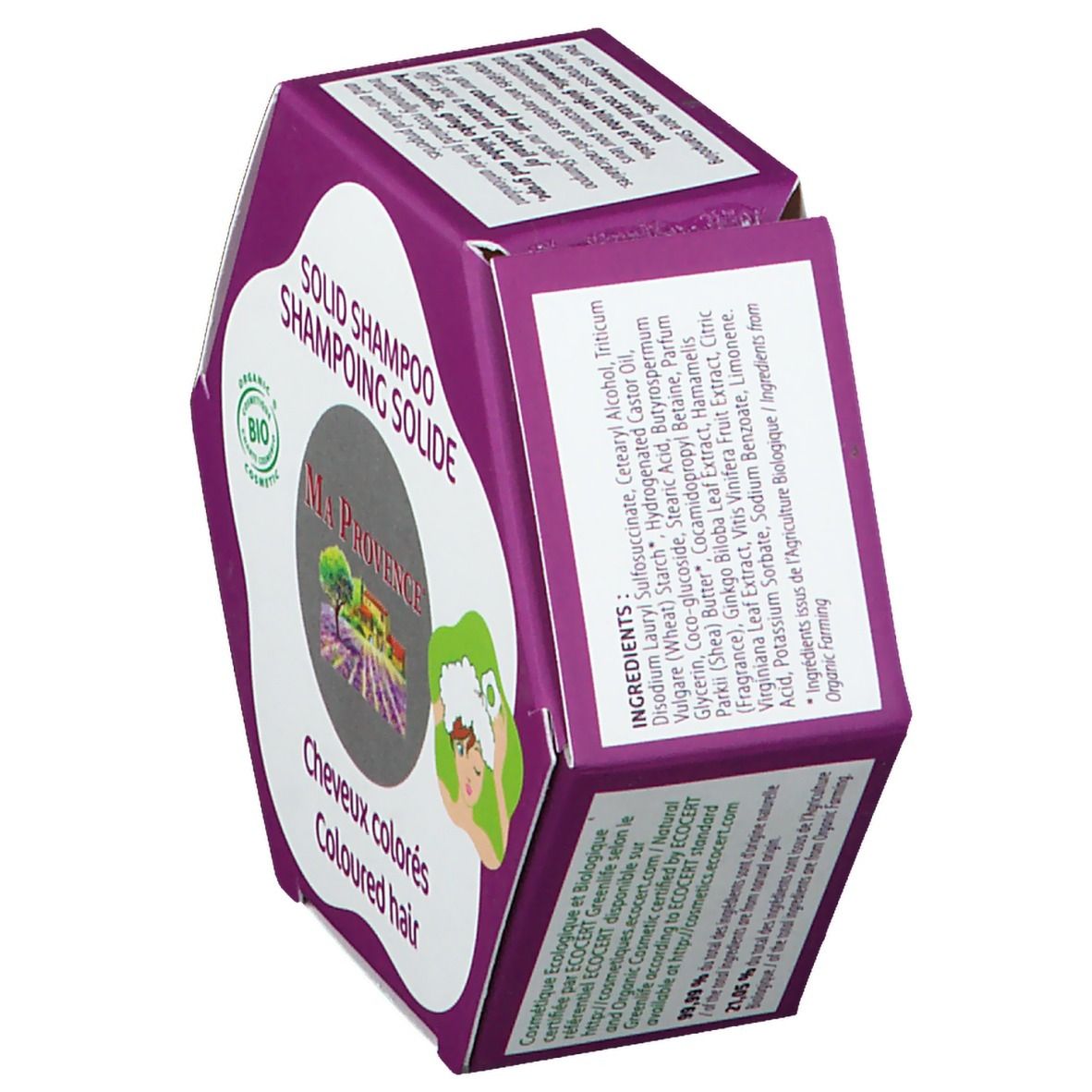 Emballage hexagonal partiellement ouvert. Liste des ingrédients et certification bio visibles. Nom et logo du produit.
