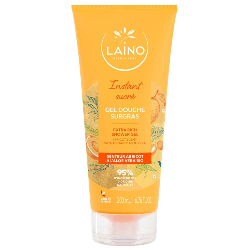 Tube jaune avec nom du produit et illustrations. Inscriptions : LAINO, Instant sucré, Gel Douche Surgras, 95% ingrédients d'origine naturelle.