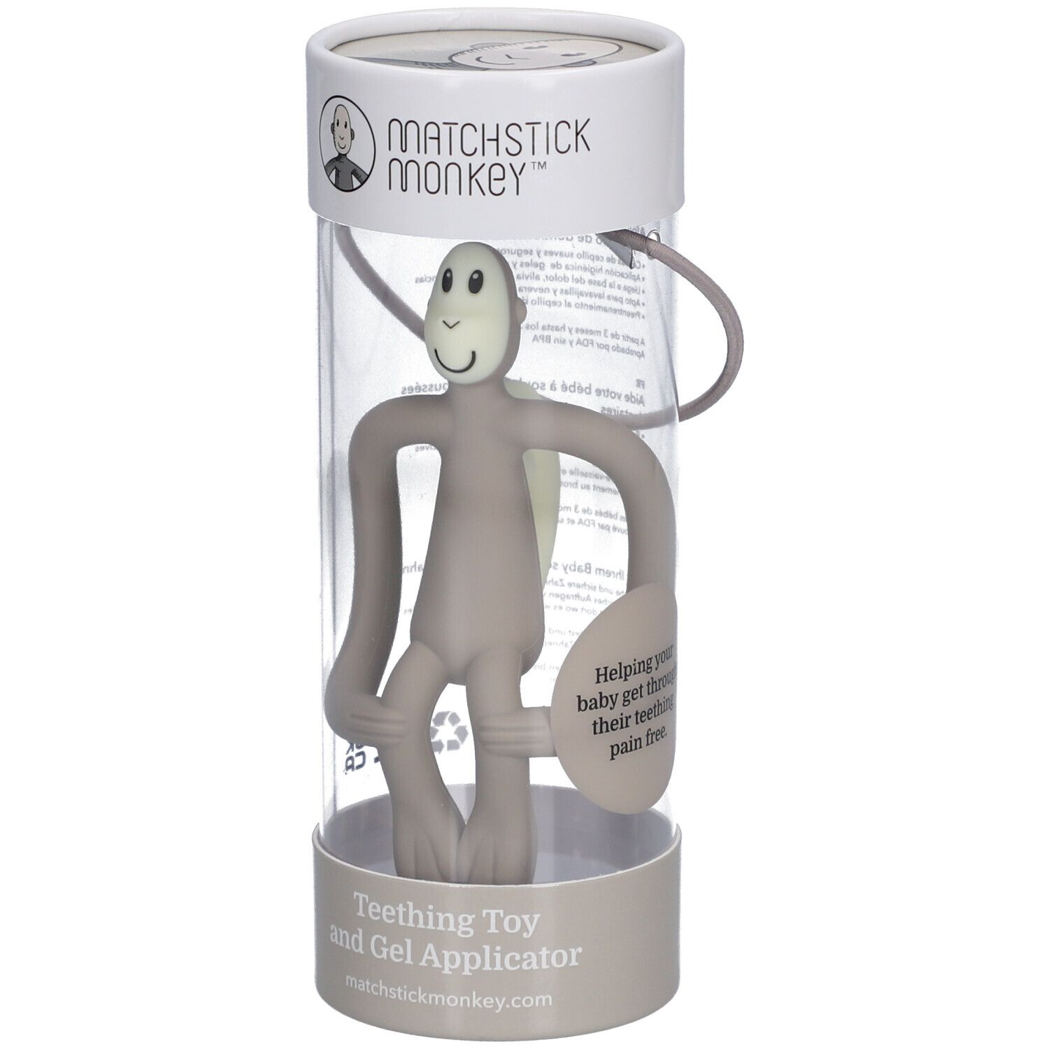 Grijze Matchstick Monkey bijtring in transparante verpakking. De aap heeft armen, benen en een hoofd. Tekst op de verpakking.
