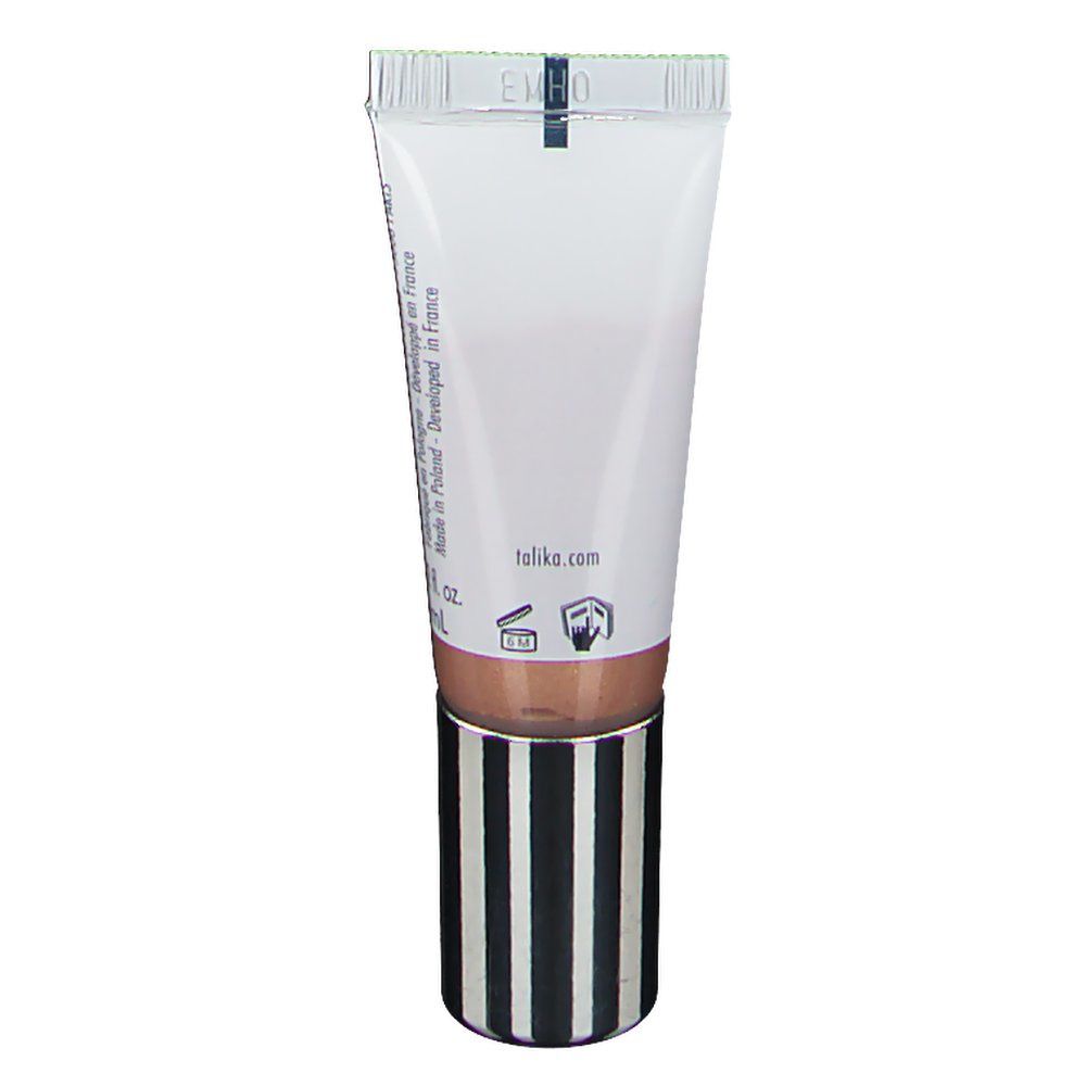 Dos du tube TALIKA Eye Shadow Lift. Tube blanc avec produit brun. Rayures noires et blanches en bas. Texte: talika.com.