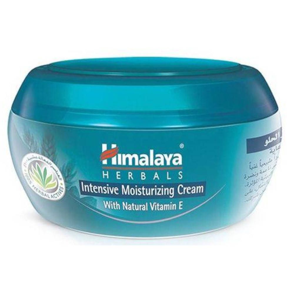 Pot turquoise avec couvercle. Inscription: Himalaya Herbals Intensive Moisturizing Cream. Avec vitamine E naturelle.