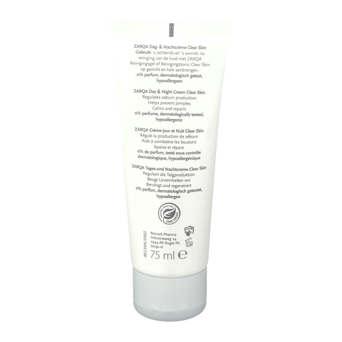 Achterkant van een witte tube met tekst. Bevat informatie over 'ZARQA Dag & Nachtcrème Clear Skin'.