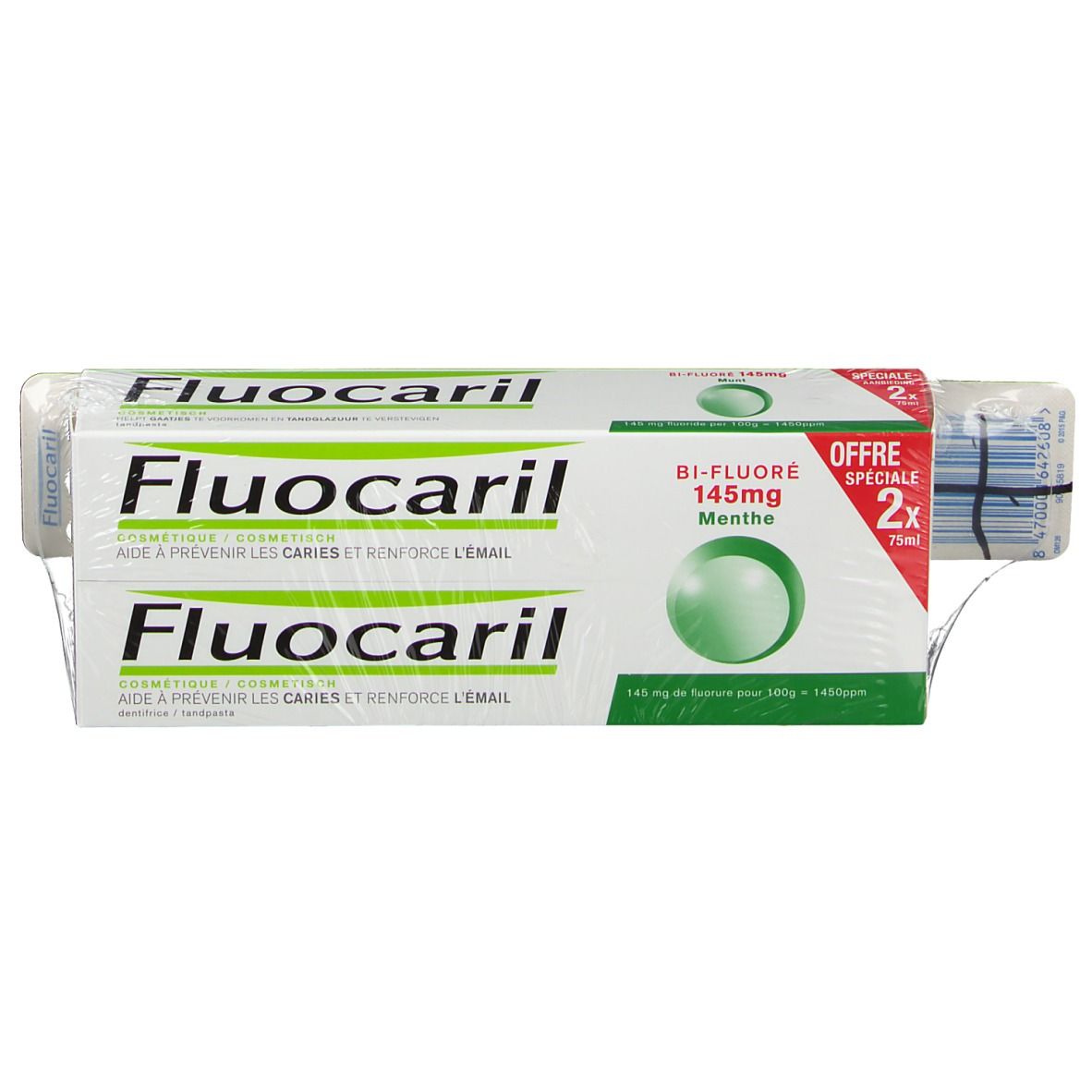 Deux tubes de dentifrice en emballage. Texte et sphère verte.