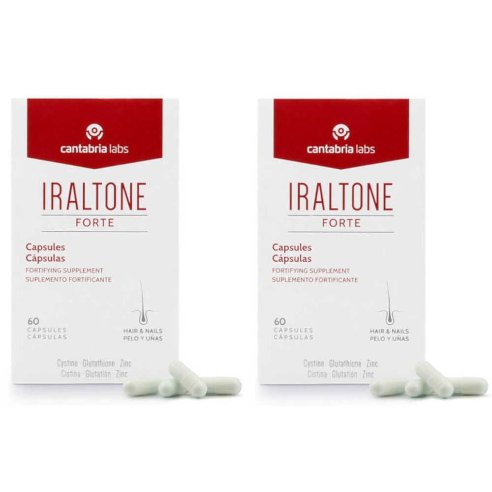 Deux boîtes IRALTONE forte avec des gélules. Inscription : 60 gélules. Produit pour les cheveux et les ongles. Gélules blanches à côté.
