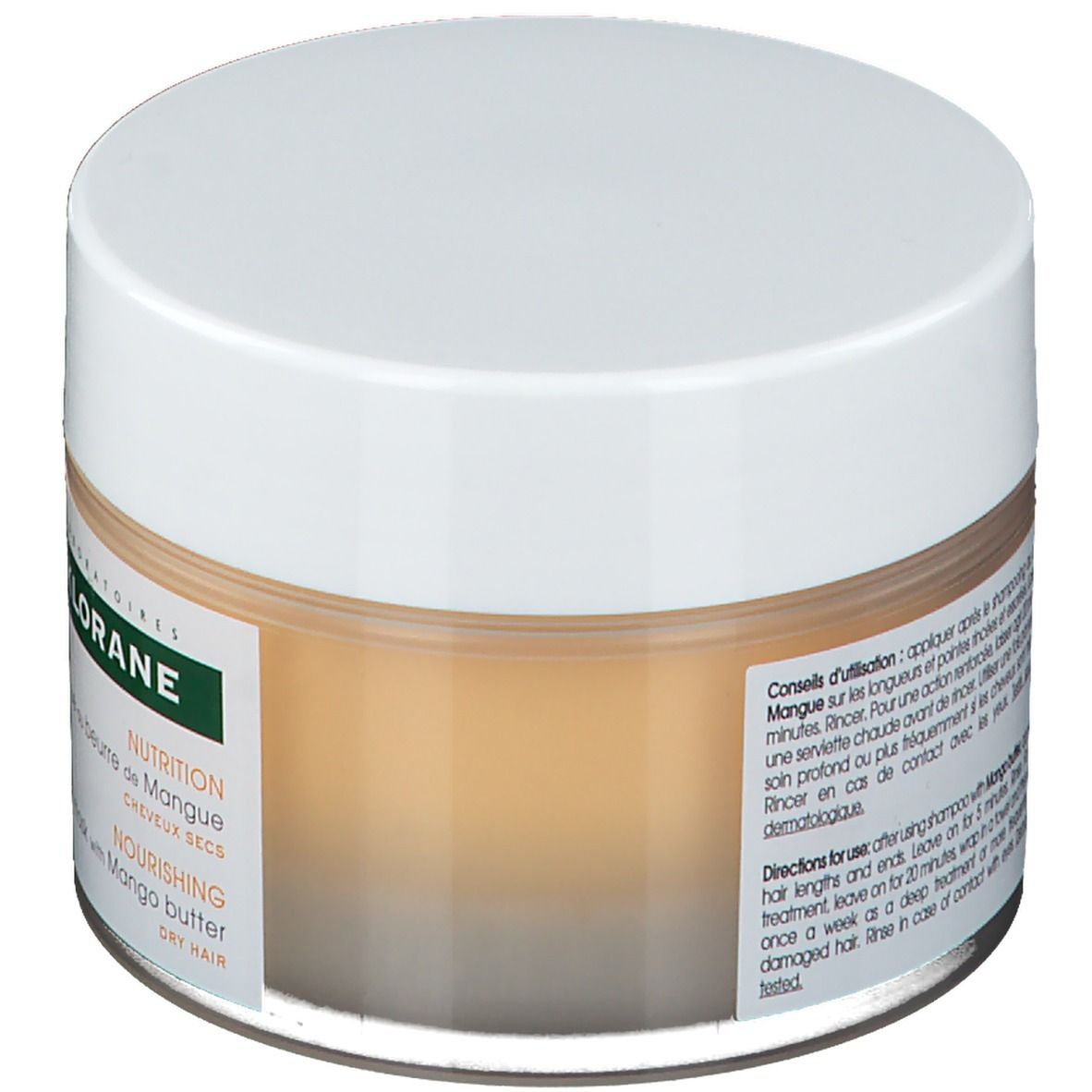 Pot de masque capillaire Klorane. Inscription: Nutrition, Nourishing, Dry Hair. Texte sur l'utilisation et les ingrédients. Vue arrière.