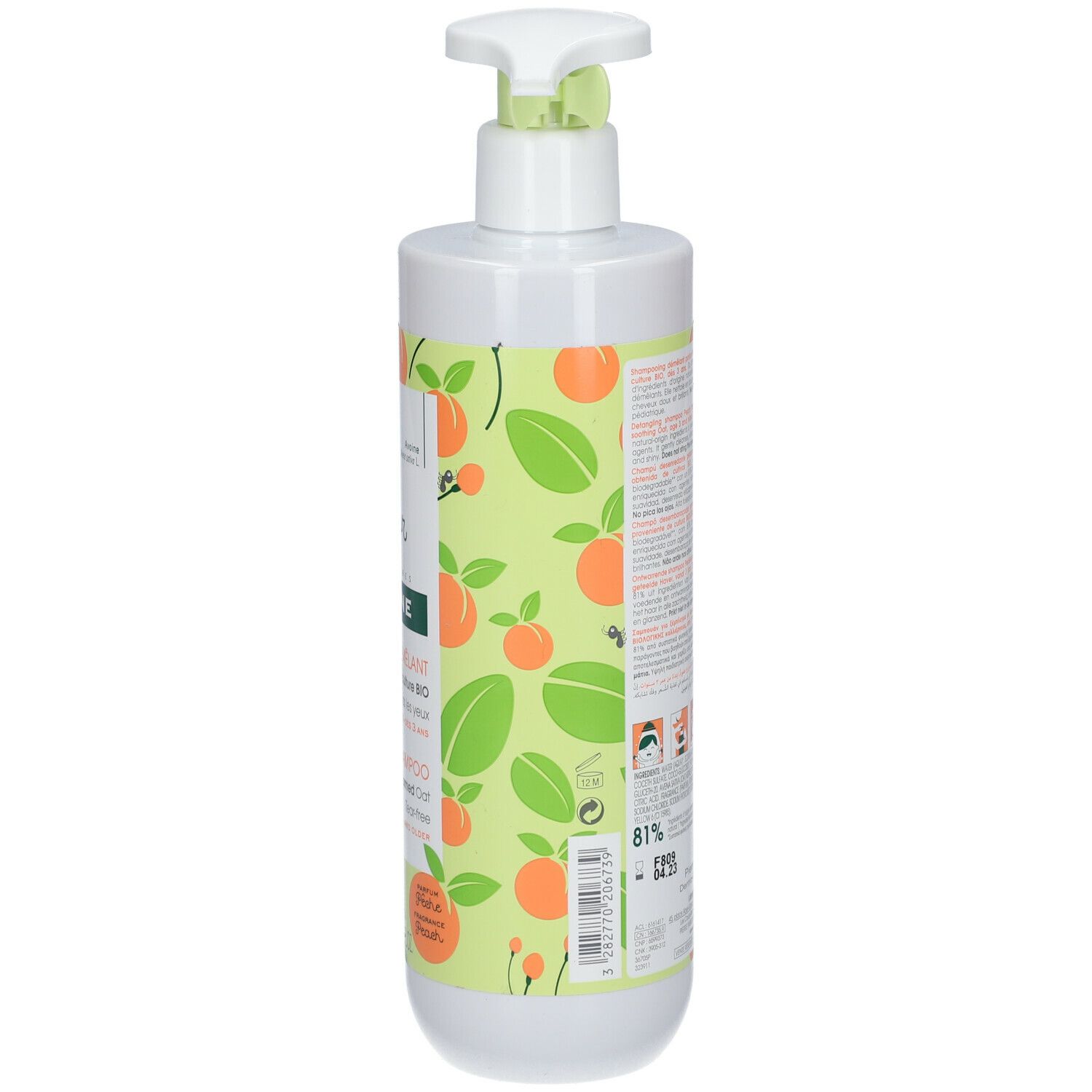 Achterkant van de witte fles met groene pomp. Tekstinformatie en illustraties. Merk: Klorane Junior.