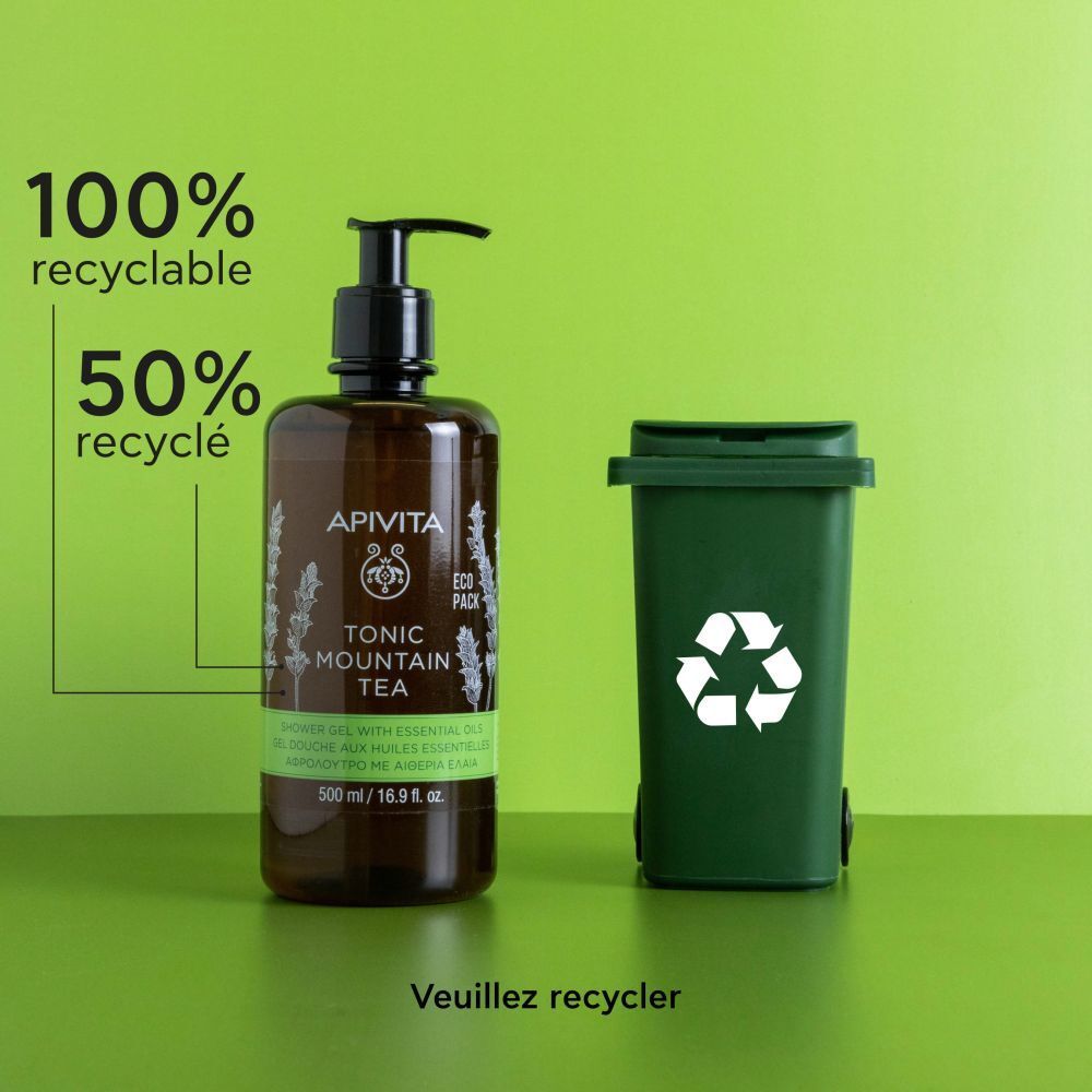 Flacon marron avec pompe noire. Inscription : APIVITA, TONIC MOUNTAIN TEA, gel douche. Étiquette verte et blanche.