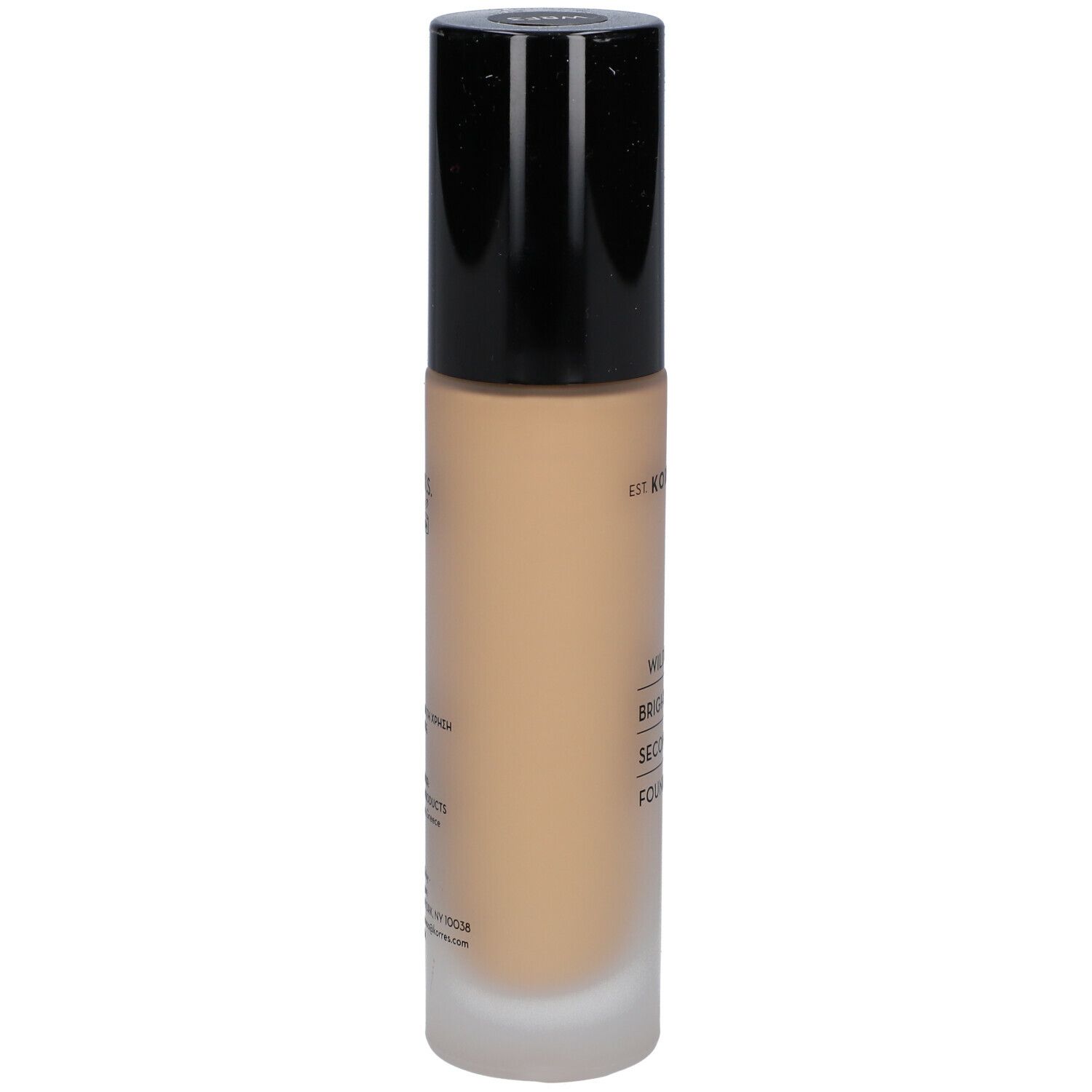 Korres Wild Rose Foundation. Fles, achteraanzicht. Zwarte dop. Opschrift: Wild Rose, Brightening Second-Skin Foundation.