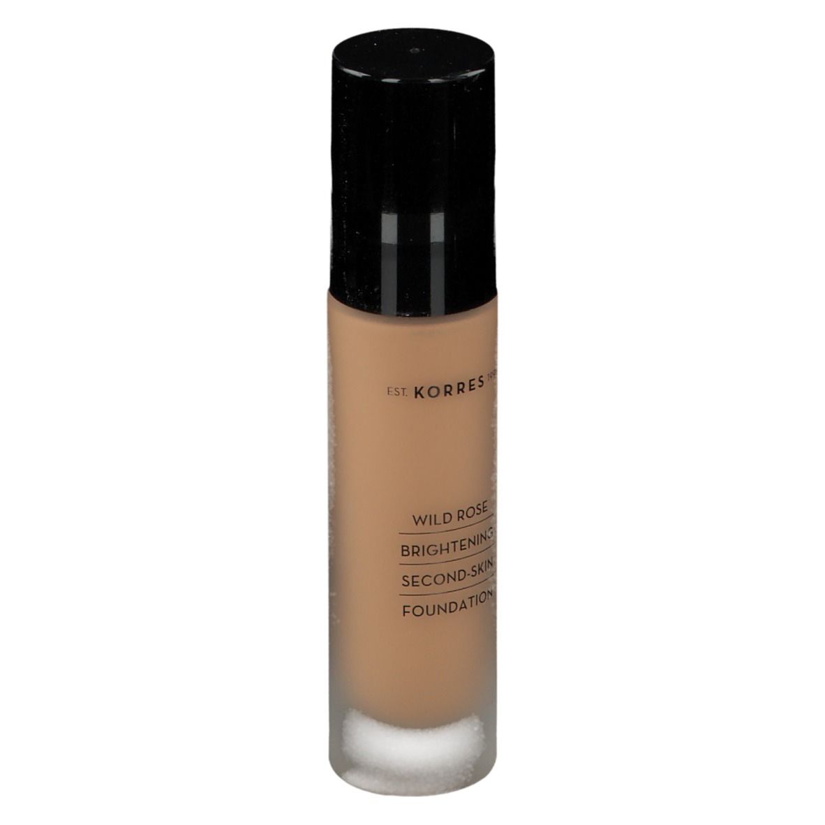 Fond de teint Korres Wild Rose. Flacon noir. Liquide beige. Texte: Brightening Second-Skin Foundation.