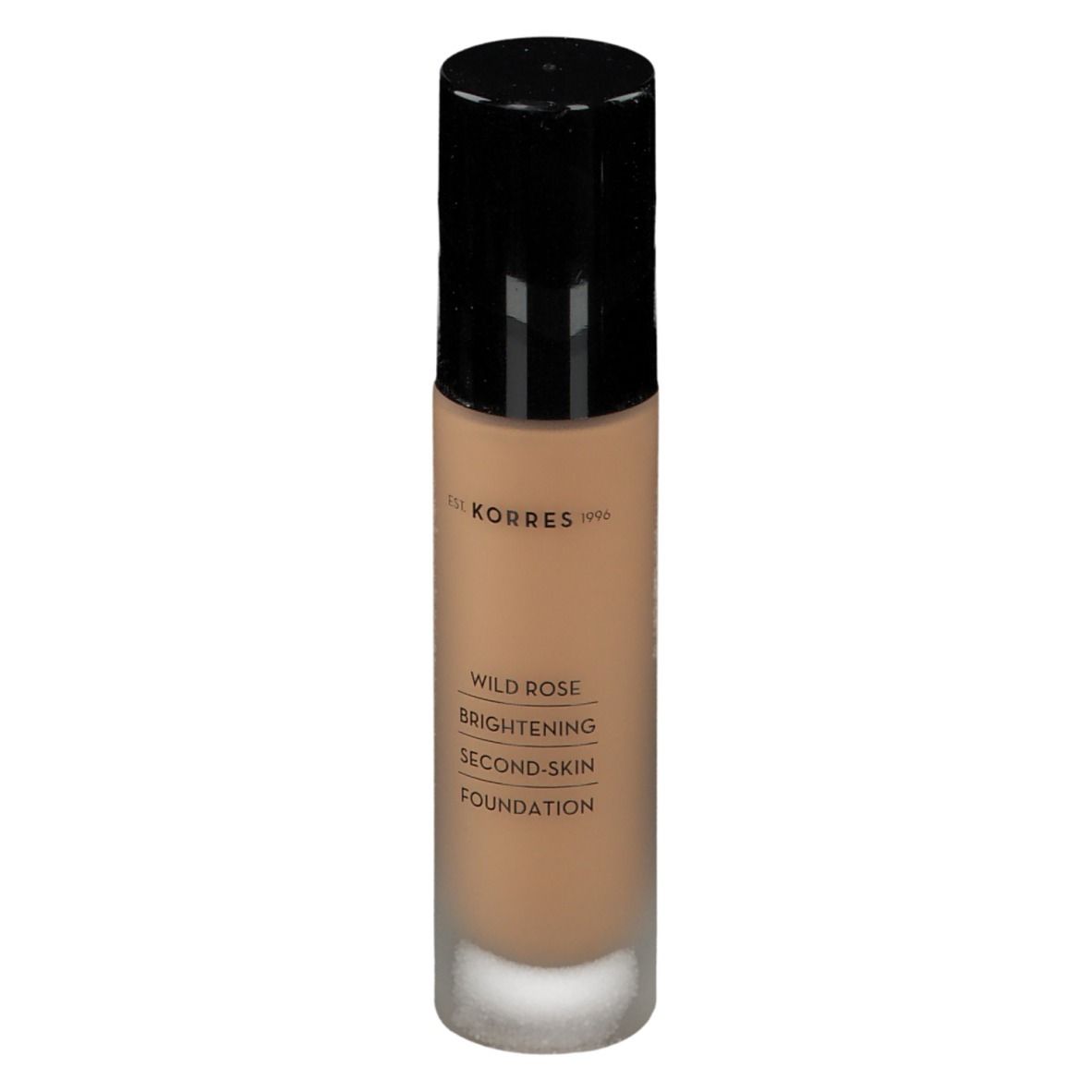 Fond de teint Korres Wild Rose. Flacon noir. Liquide beige. Texte: Brightening Second-Skin Foundation.