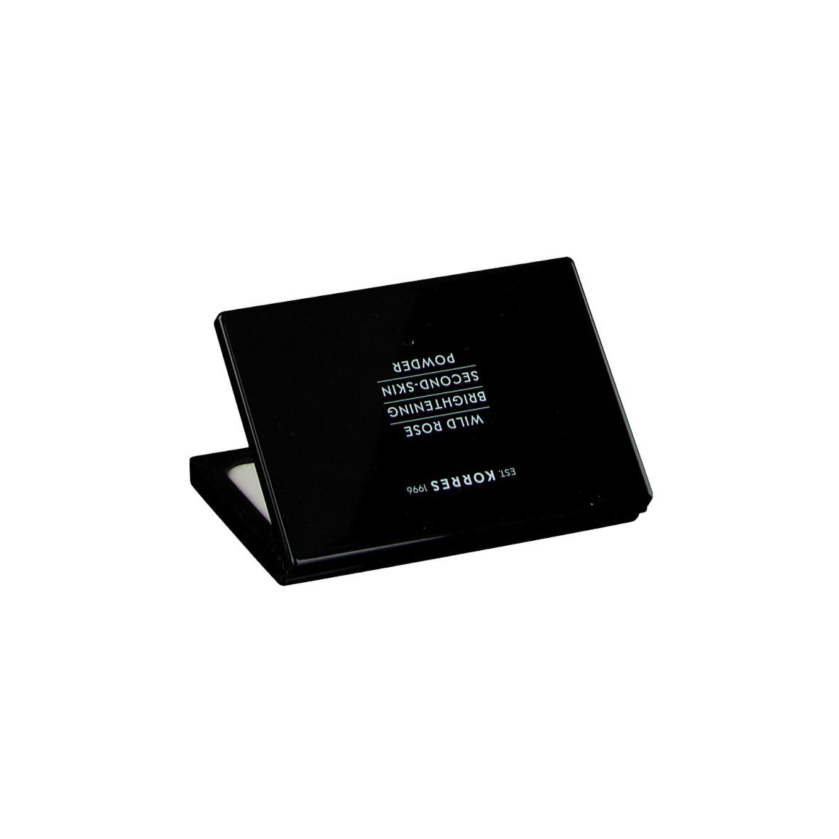 Gesloten compact poeder. Zwarte behuizing met tekst: WILD ROSE SECOND SKIN POWDER, merk Korres.