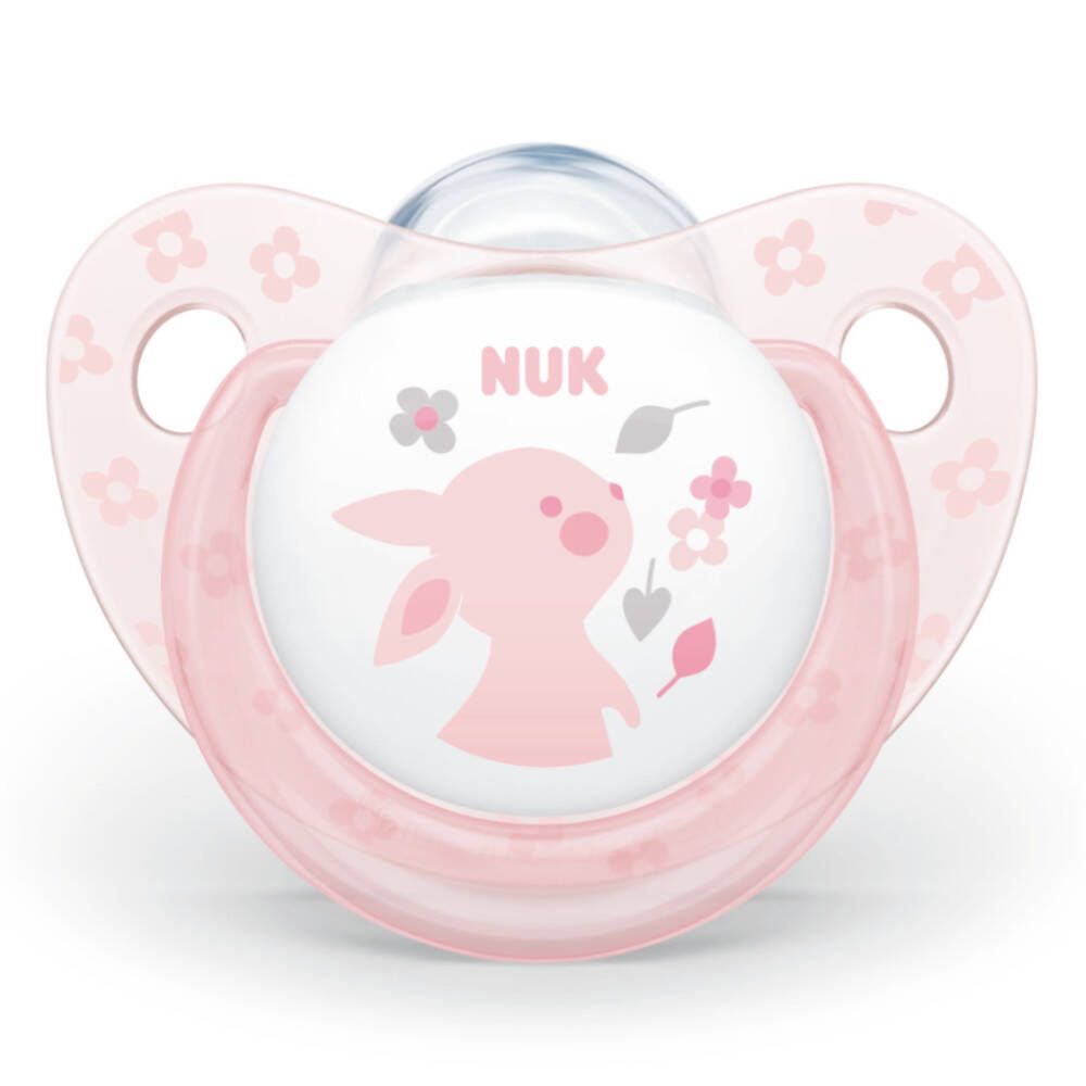 Une sucette rose avec un motif de lapin et le logo NUK.