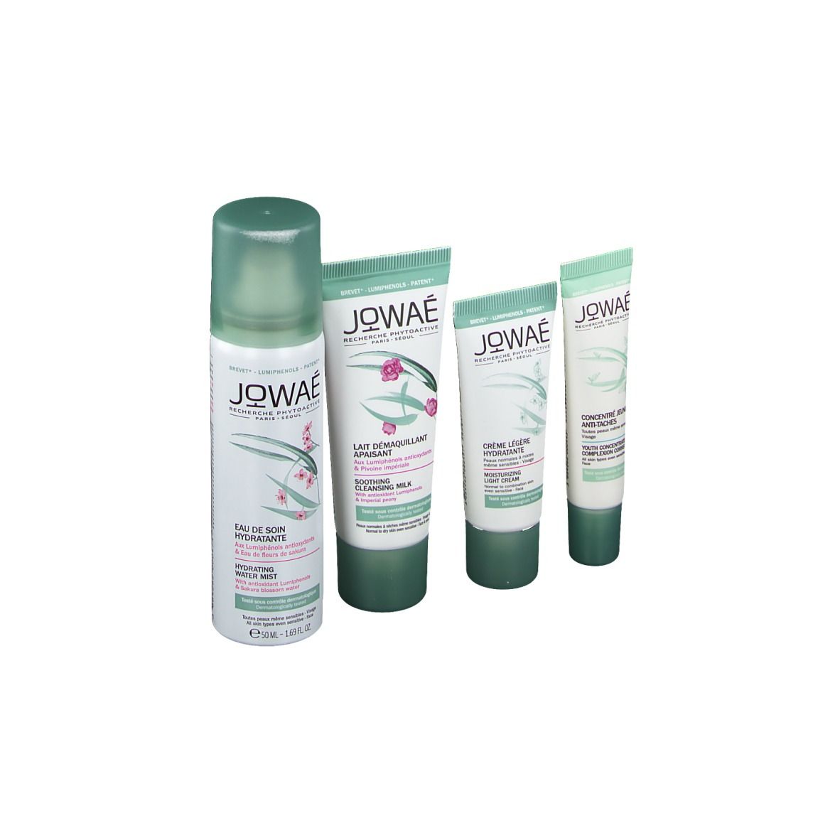 Quatre produits : bouteille et trois tubes. Inscription : JOWAÉ. Produits : lait, crème, concentré, brume.