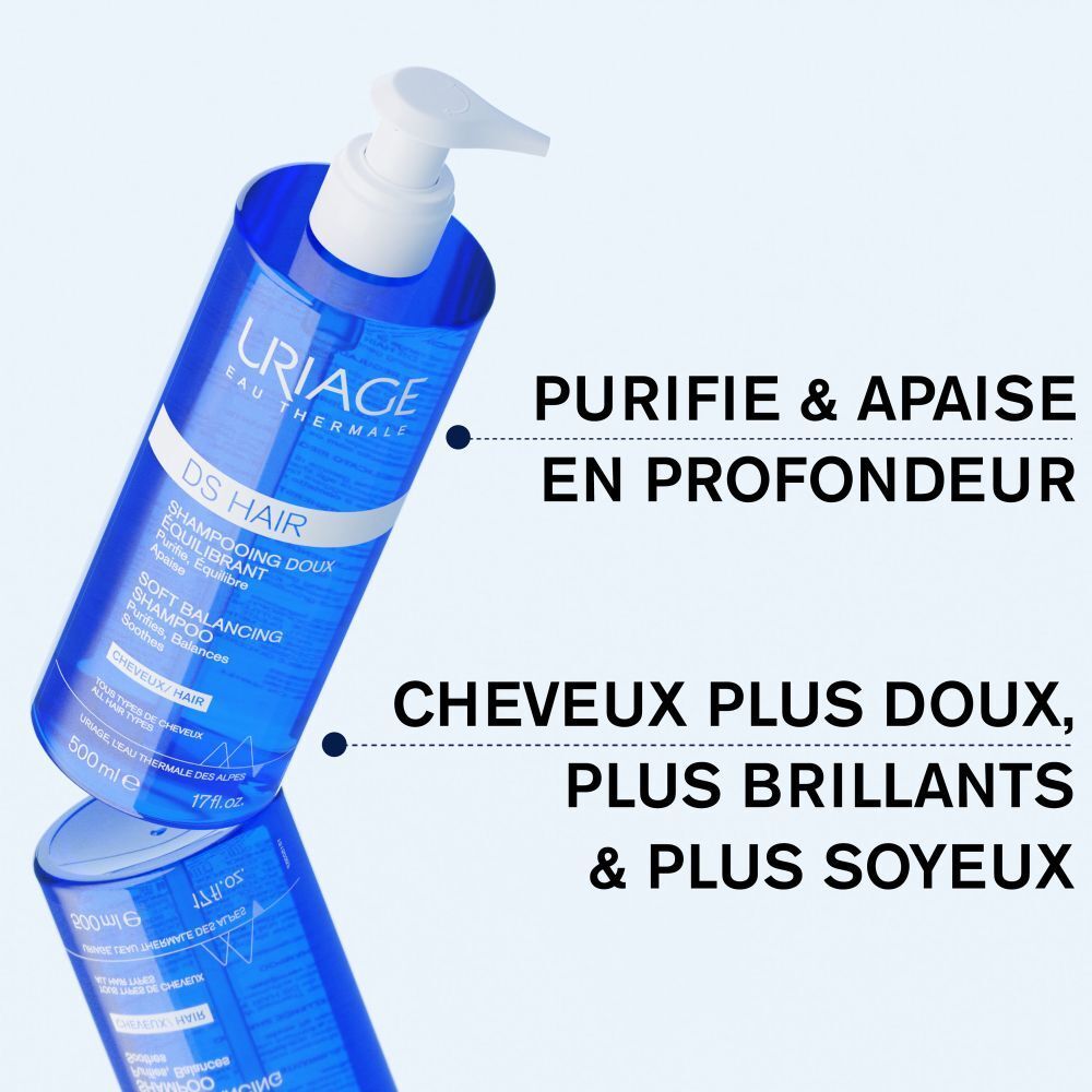 Dos du flacon bleu avec pompe blanche. Texte multilingue. URIAGE, DS HAIR, Soft Balancing Shampoo.