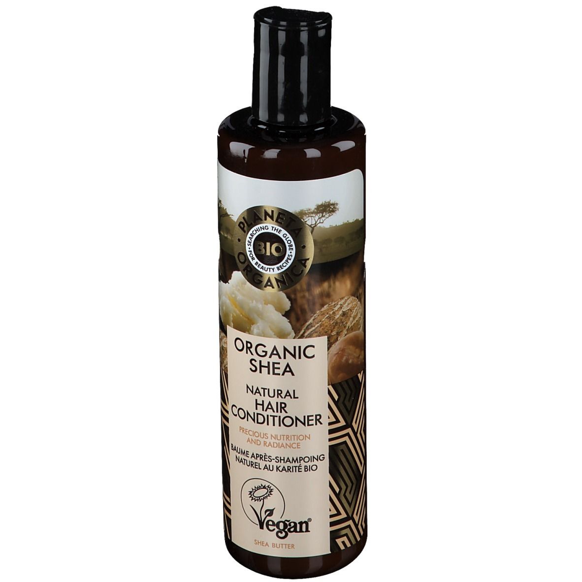 Braune Flasche mit schwarzem Deckel. Etikett mit Produktnamen, Shea-Butter-Abbildung und Vegan-Siegel.