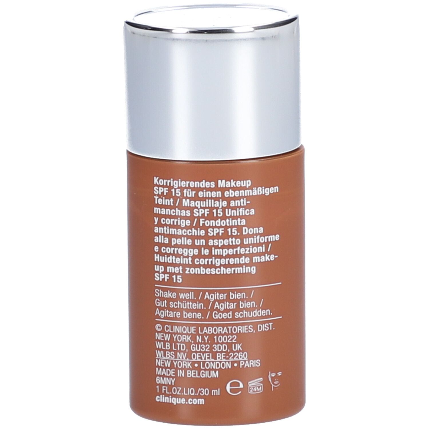 Rückseite einer braunen Make-up-Flasche. Text: Korrigierendes Makeup SPF 15, Inhaltsstoffe, Herstellerinformationen.