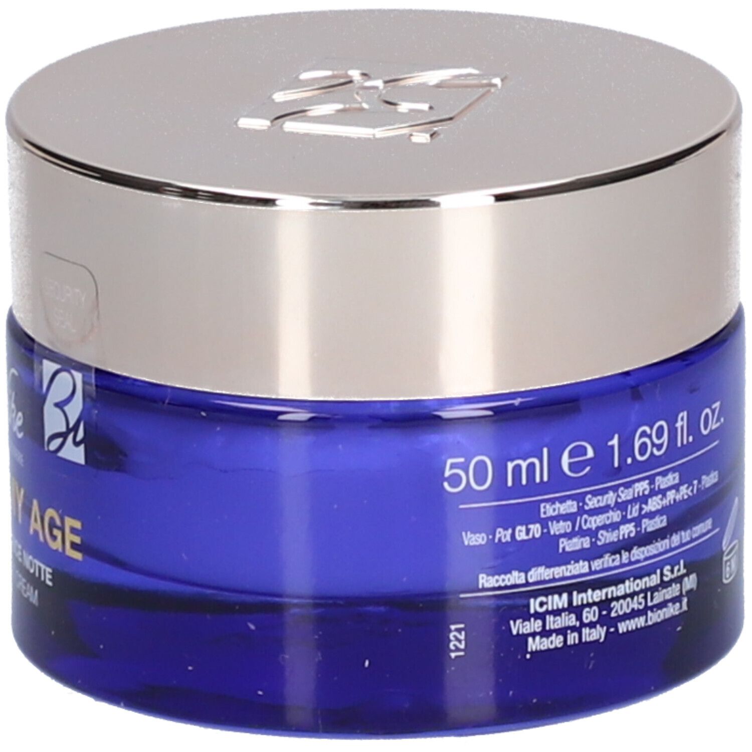 Blauwe crèmepot met zilveren deksel. Opschrift: 50 ml e 1.69 fl. oz. BioNike, DEFENCE MY AGE, Creme Rinnovatrice Notte.