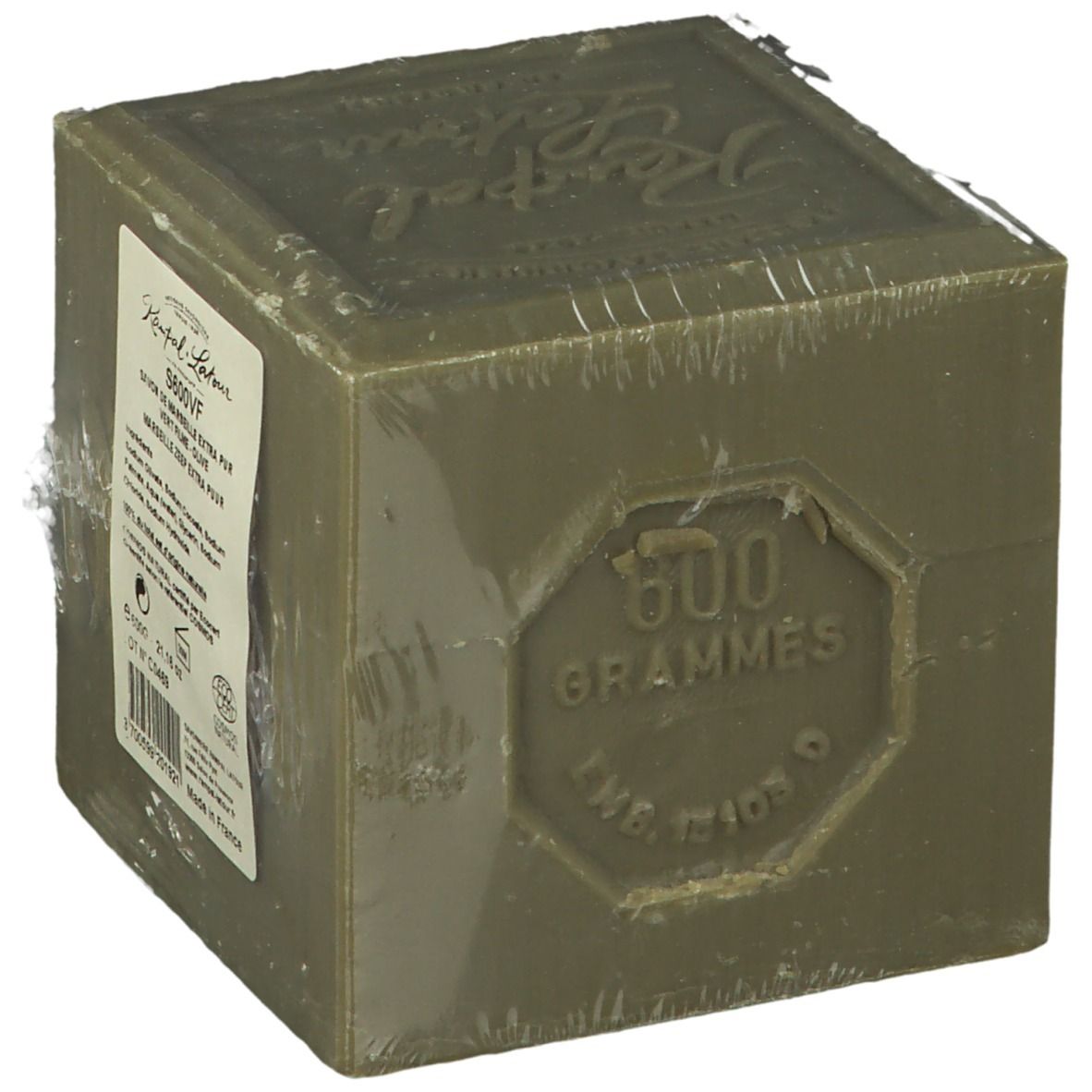 Savon d'olive emballé dans du film plastique. Inscriptions: Rampal Latour, S600VF, 600 grammes. Ingrédients. Couleur verdâtre.