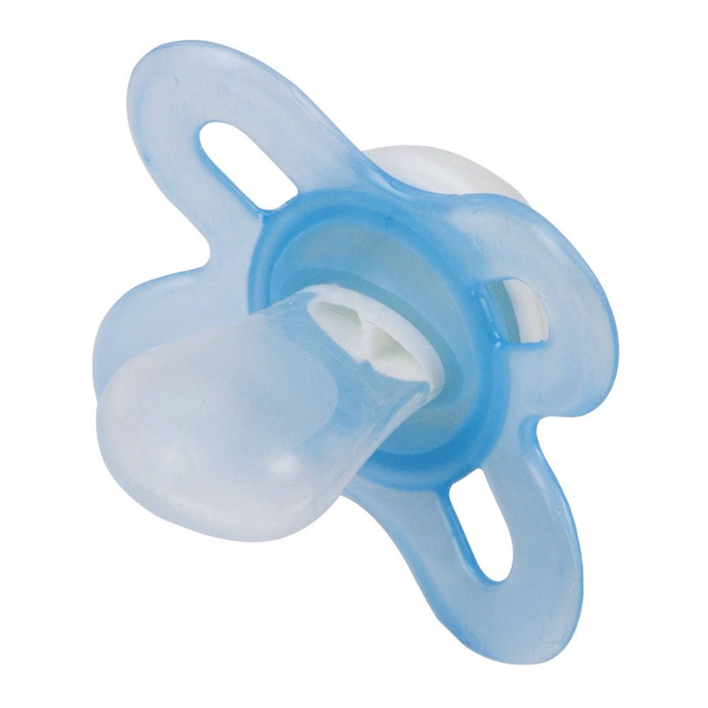 Sucette bleue, vue détaillée. Tétine ronde, bords en forme d'ailes. En silicone.
