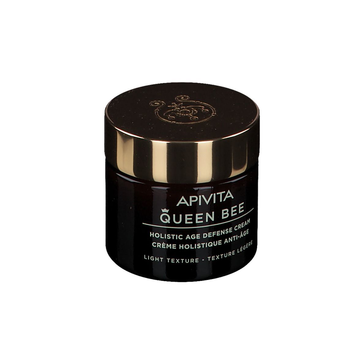 Donkere glazen pot met gouden deksel. Opschrift: APIVITA Queen Bee. Tekst in het Engels en Frans.