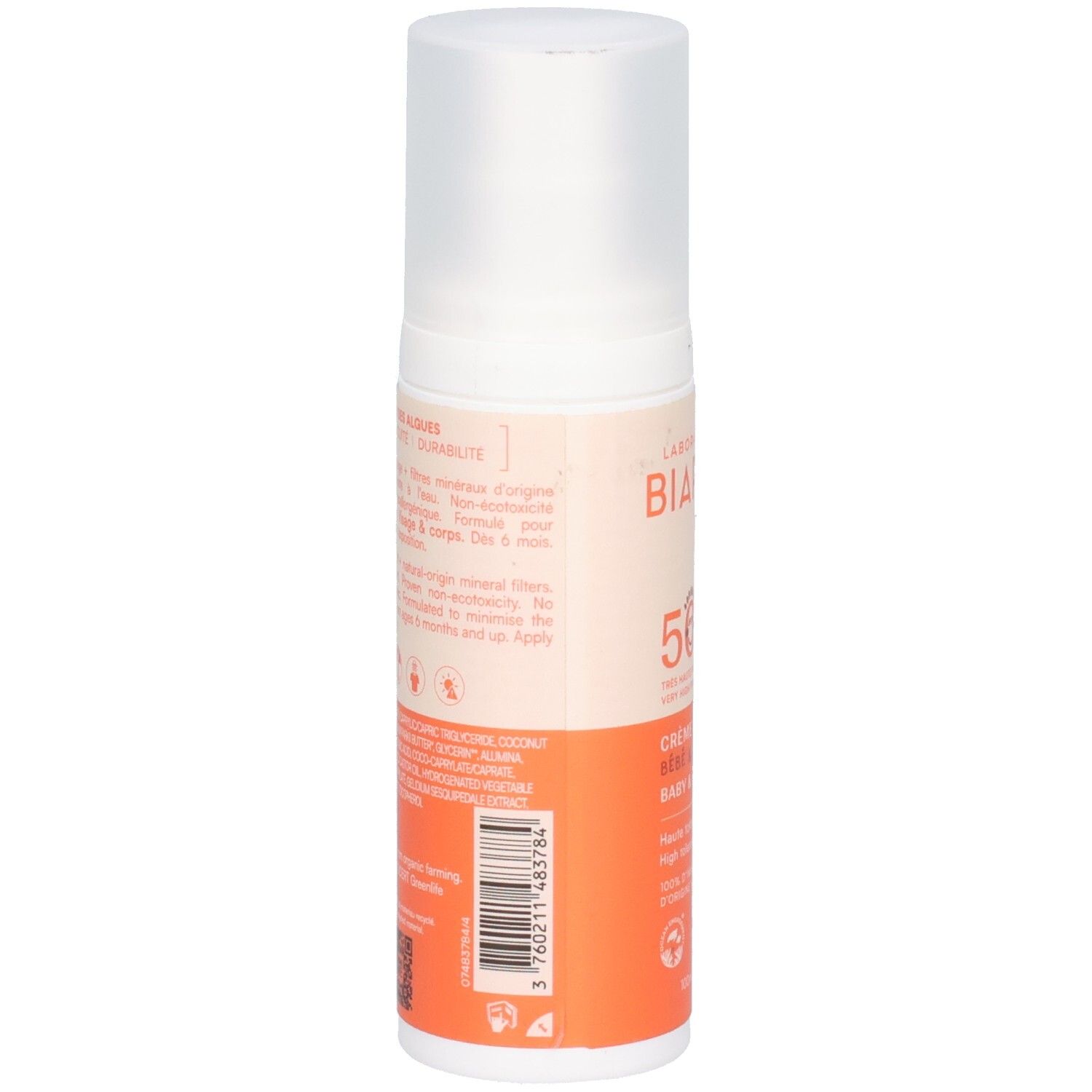 Rückseite der Sonnencreme-Flasche. Text in mehreren Sprachen. Orangefarbener und beiger Aufdruck.