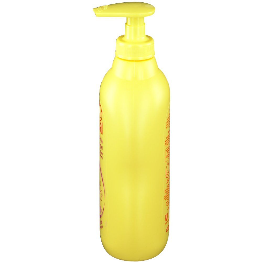 Gele fles met doseerpomp, zijaanzicht. Geen verdere details zichtbaar.